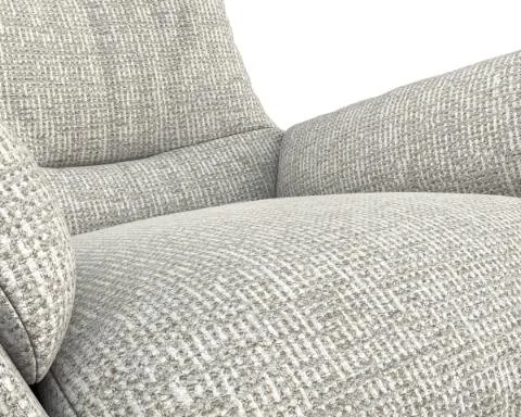 Photo d'un canapé en tissu gris clair avec un coussin assorti.