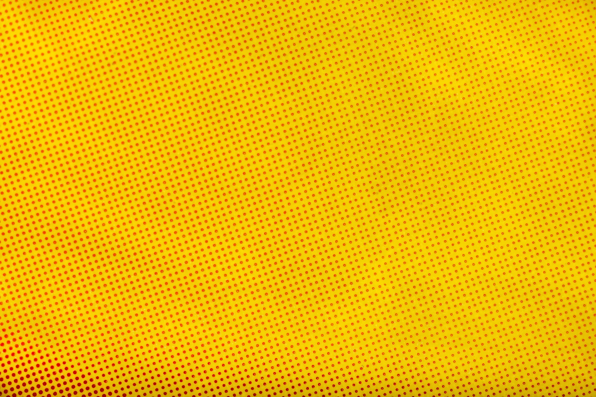 Motif de points rouges et jaunes en style pop art
