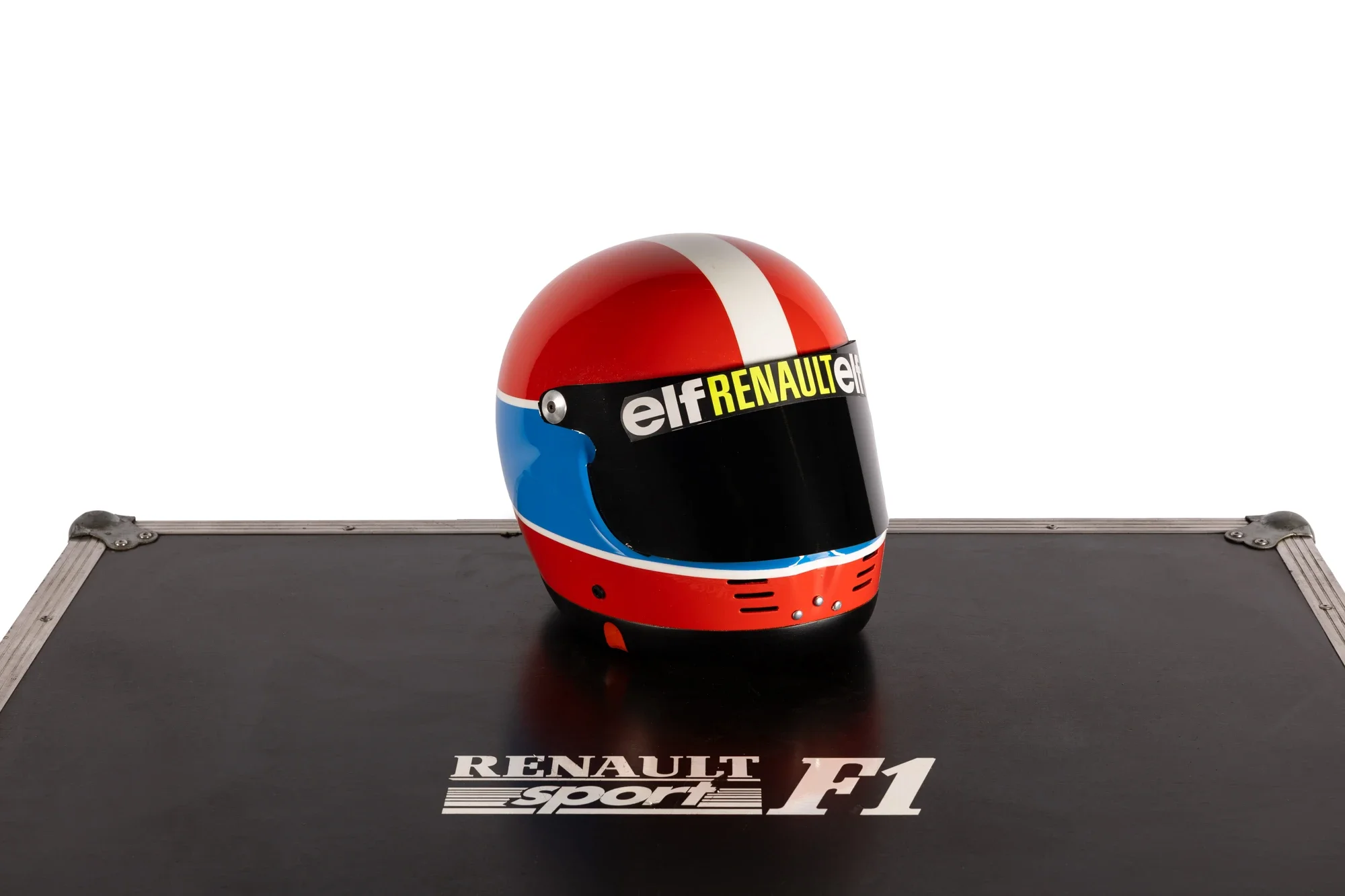 Casque de pilote de Formule 1 aux couleurs de Renault, rouge, blanc et bleu avec logos 'elf' et 'Renault Sport'