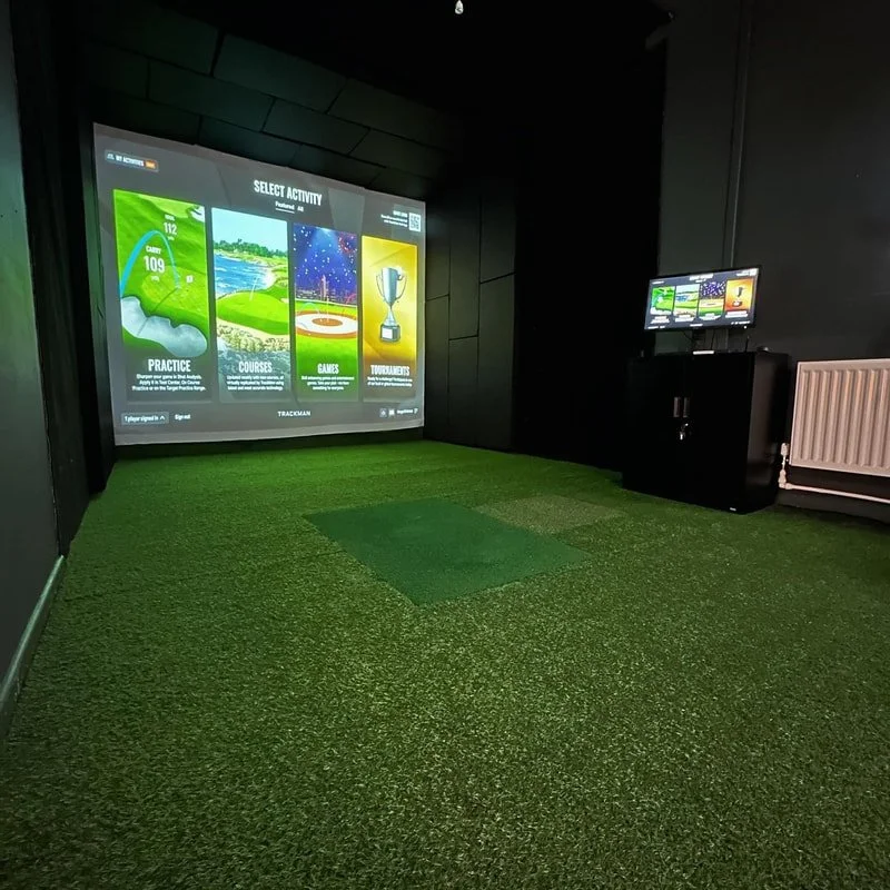 Indoor Trackman iO simulator bay at Stonham Barns Golf Park - perfect for coaching sessions, gap testing and data-led performance monitoring to improve your golf.