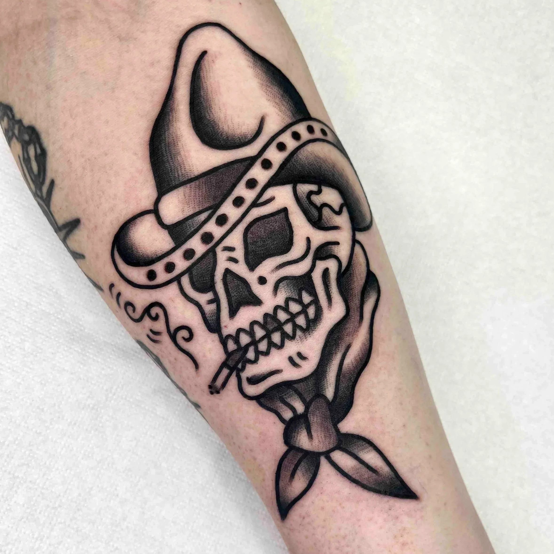Traditional cowboy tattoo detail with clean shading by Abra Tattoo Artist Berlin