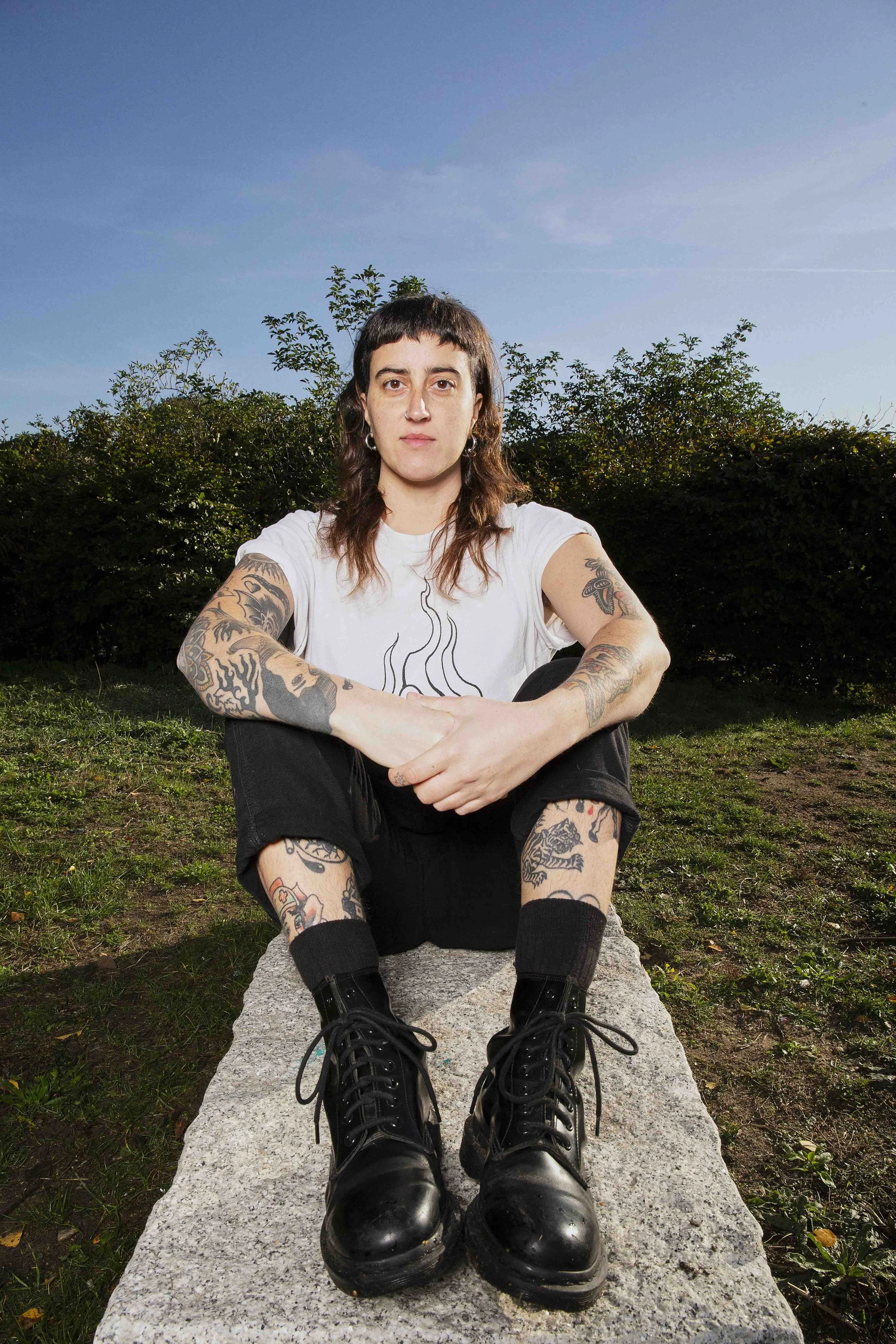 Portrait of Abra, tattoo artist based in Berlin specializing in traditional tattoos