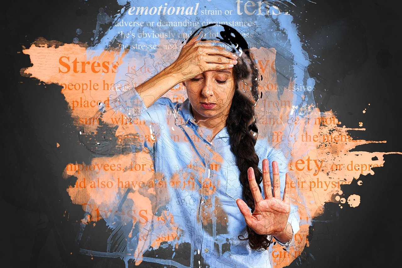 A distressed woman with long dark hair in a braid, wearing a light blue shirt, holding her forehead with one hand and extending the other hand in front of her, with digital paint splatters and overlayed text about stress and emotional strain.