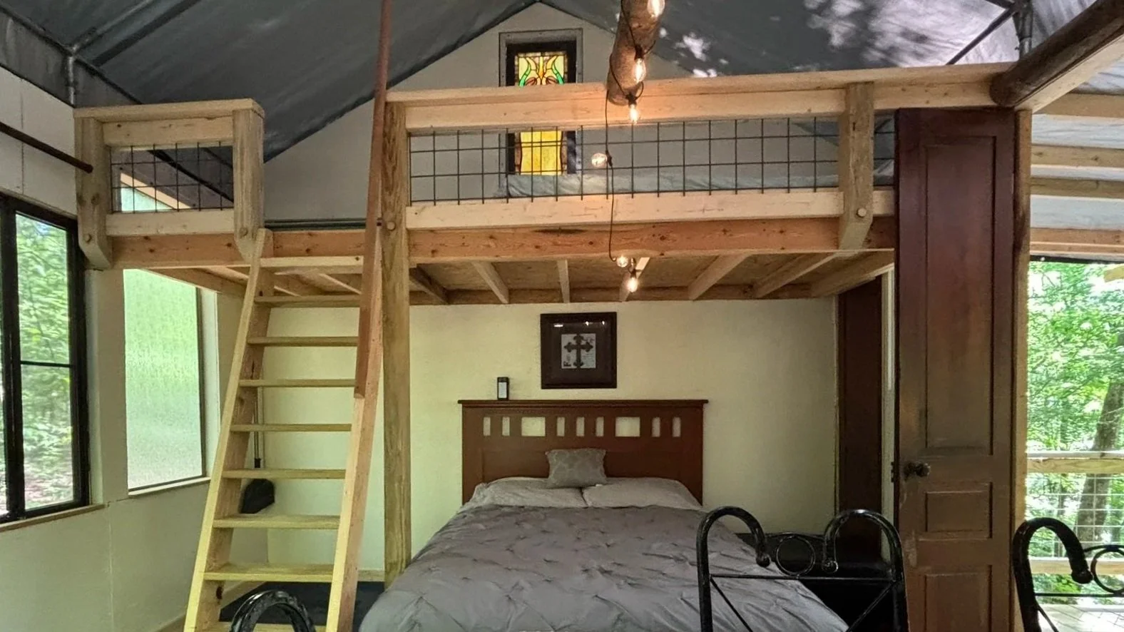 Double bed on the loft above the main queen bed.