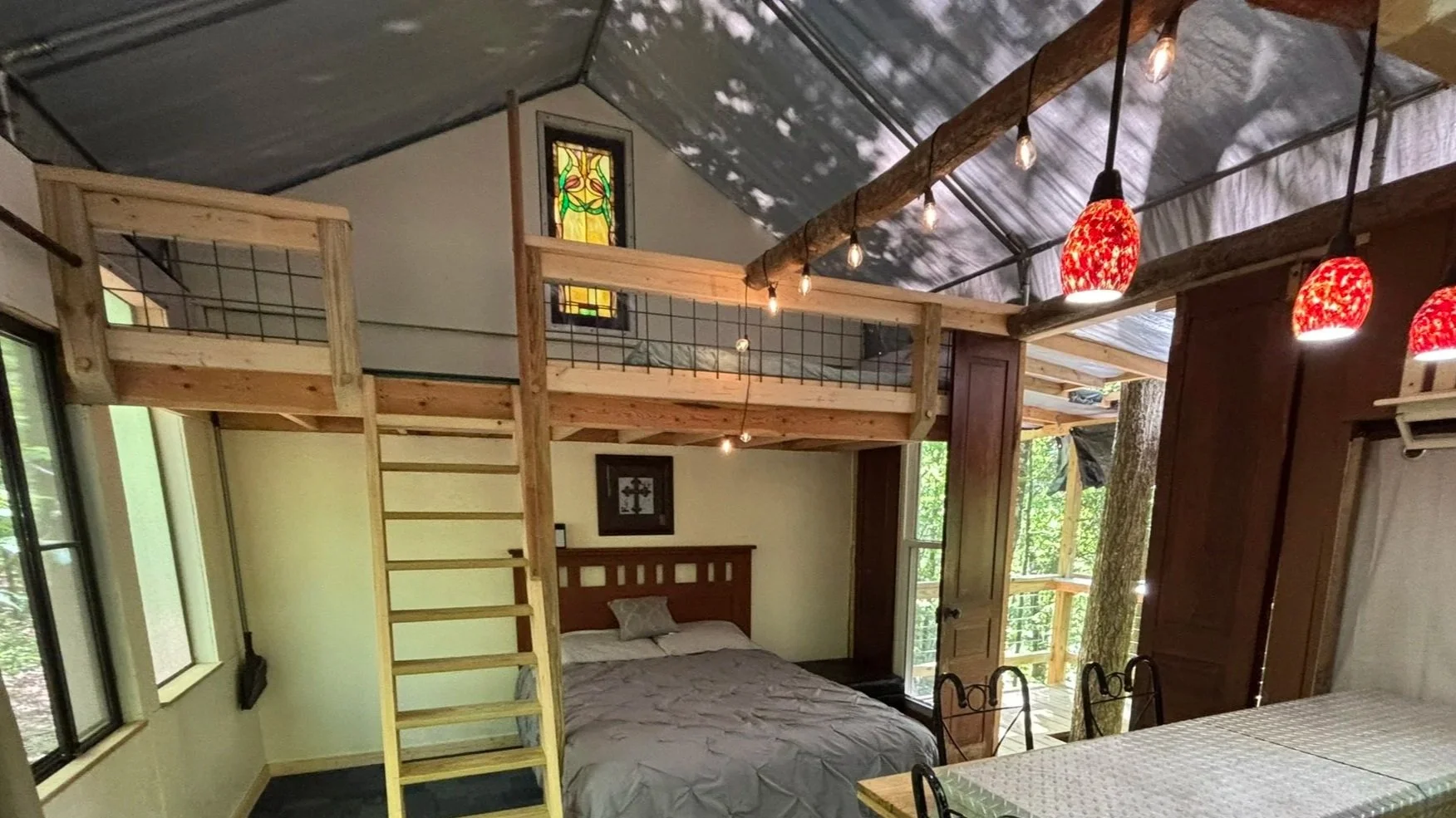 Stained Glass window above loft evokes the Inner Sanctum Vibe