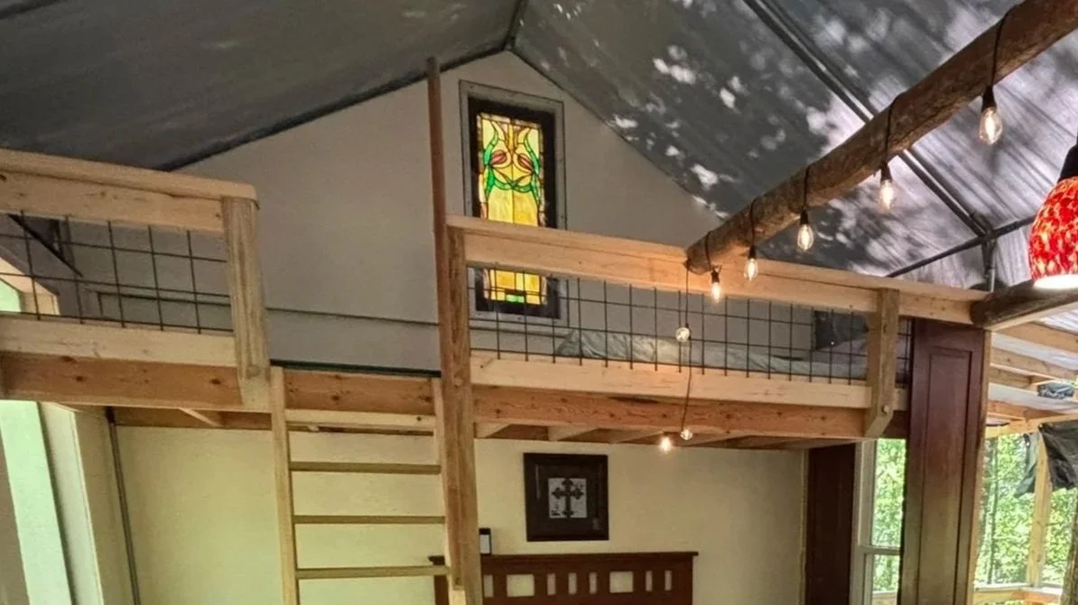 Stained Glass window above loft evokes the Inner Sanctum Vibe