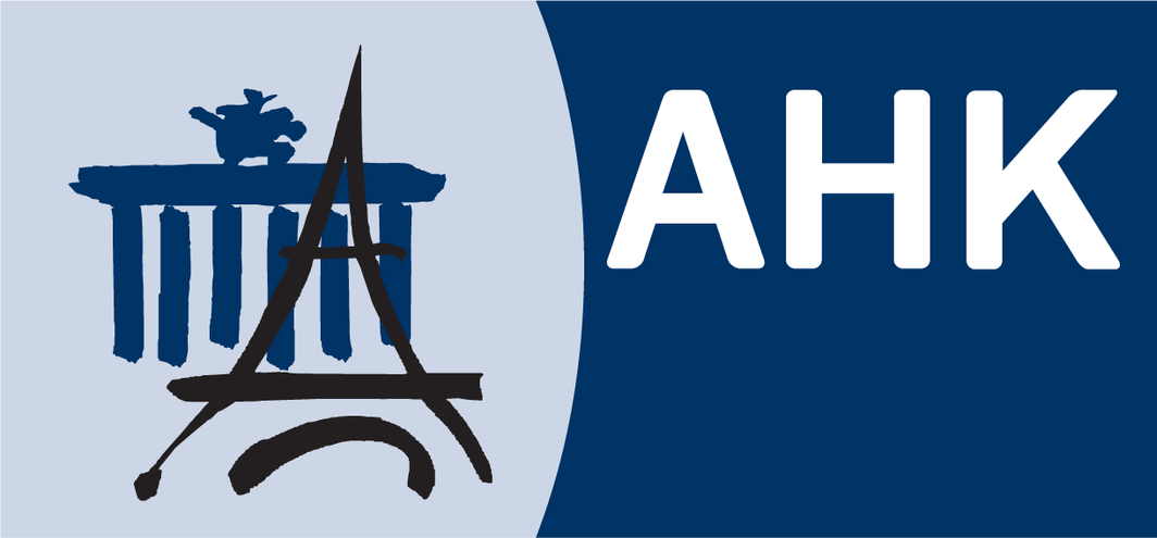 A stylized logo with a depiction of the Parthenon, a sketch of the Eiffel Tower, and the letters 'AHK' on a blue background.
