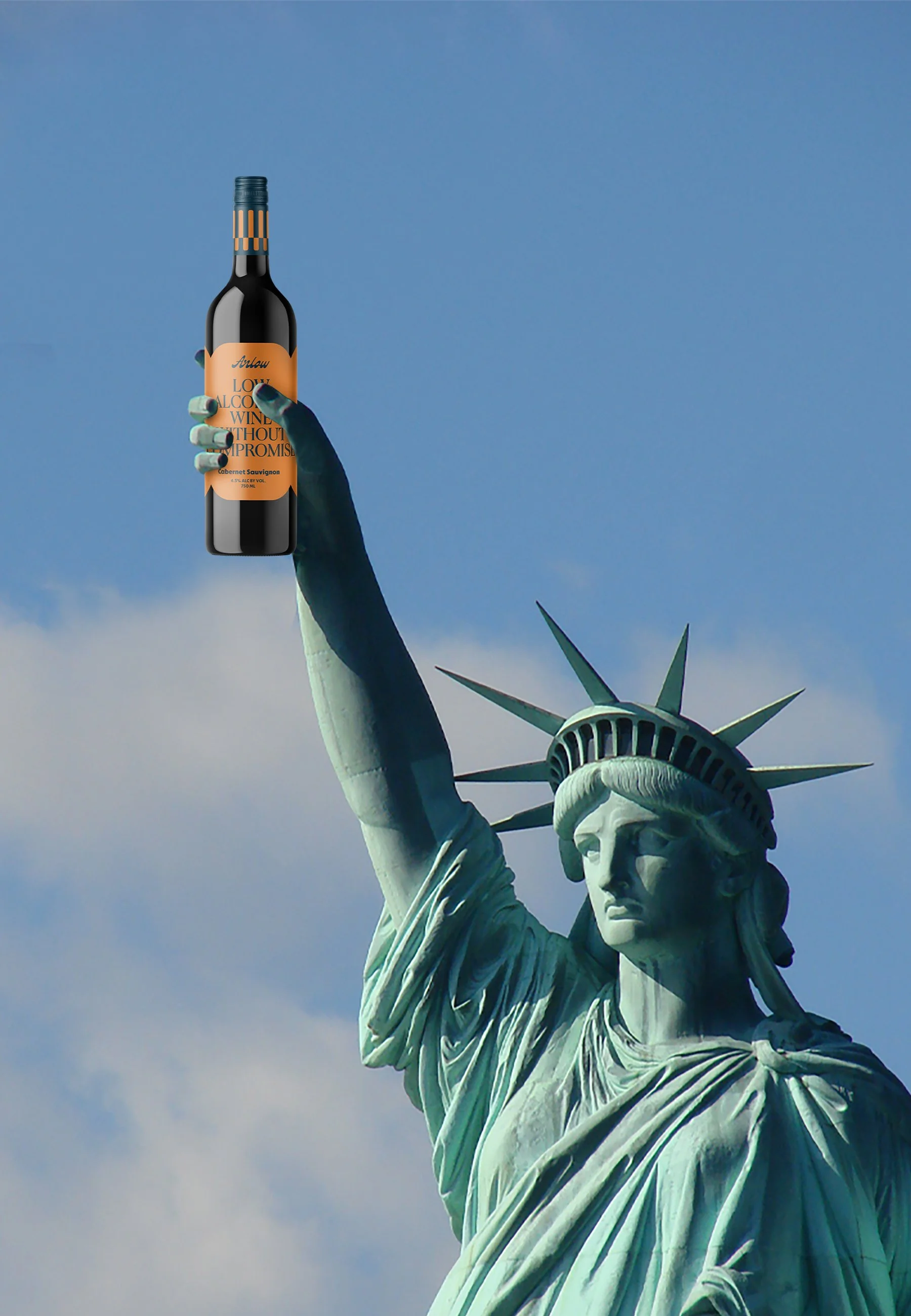 A digitally manipulated image of the Statue of Liberty holding a bottle of wine labeled 'Love Alcohol' with a bright blue sky and clouds in the background.