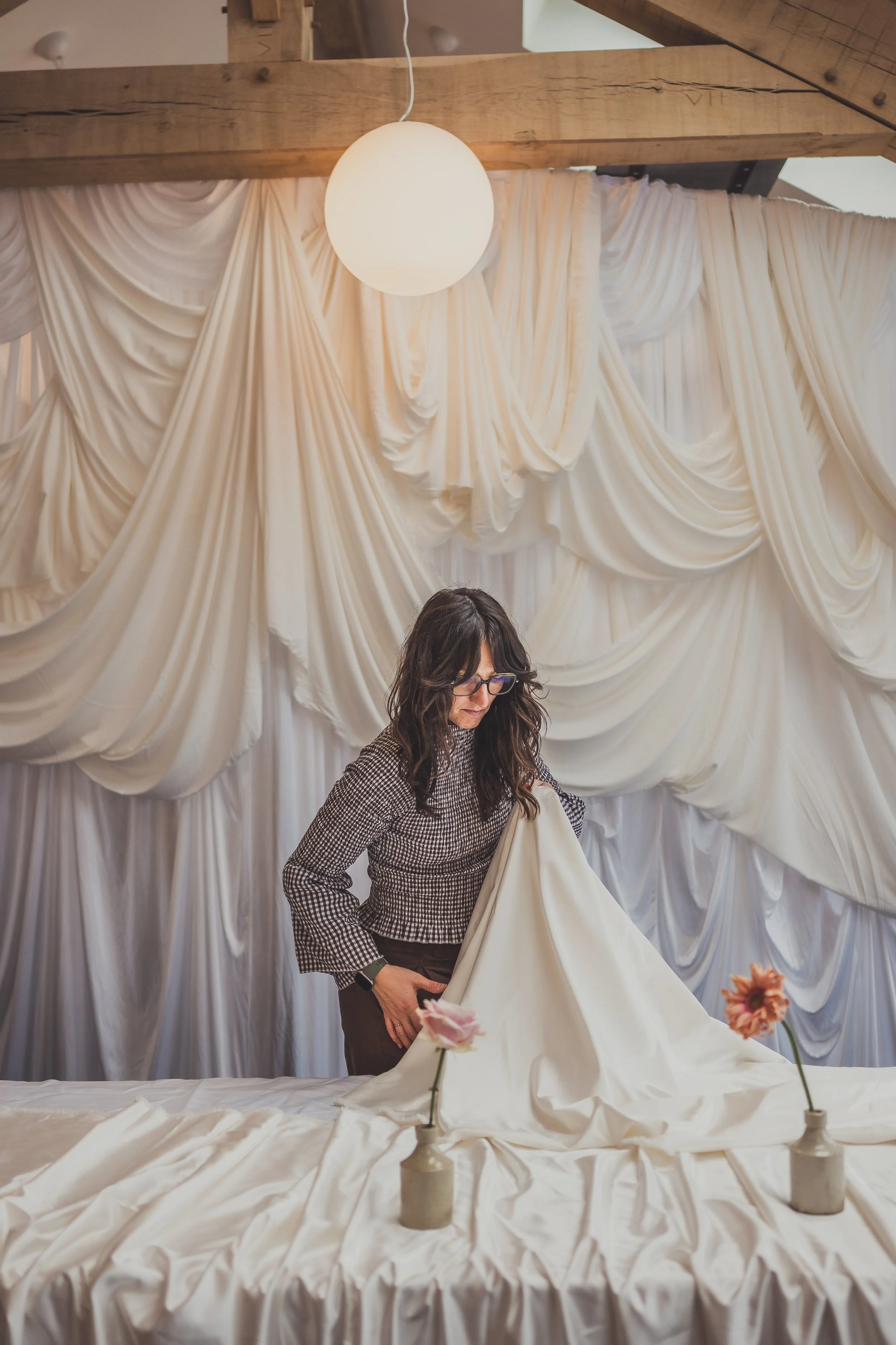 Woman with dark haiYour wedding planner preparing a wedding.