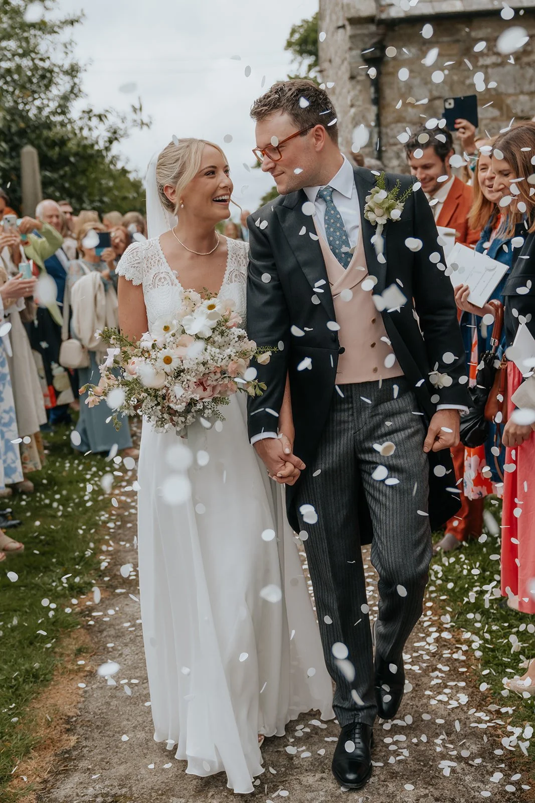 Bride and Groom with white confetti