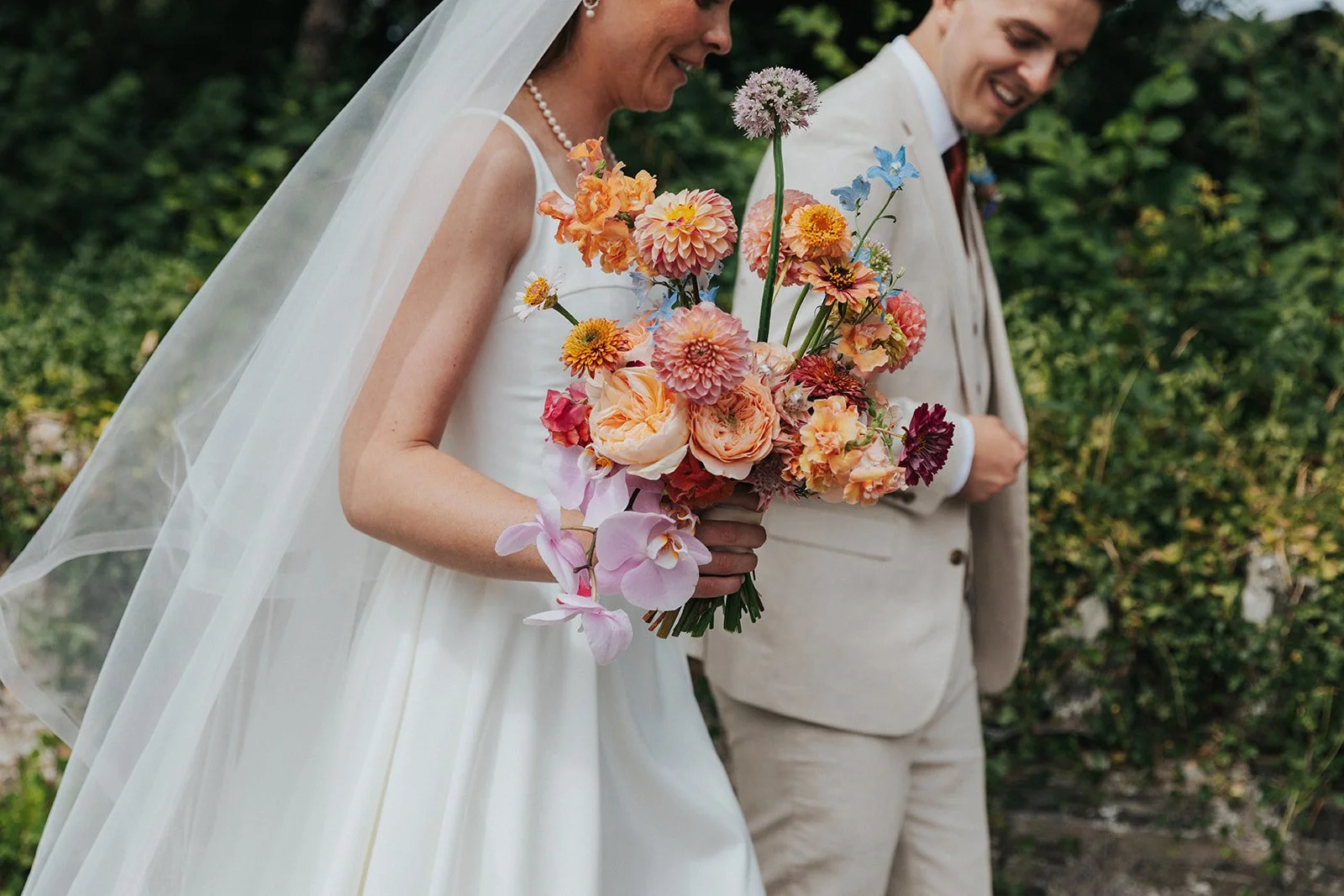 Bride and Groom with Summer bouquet