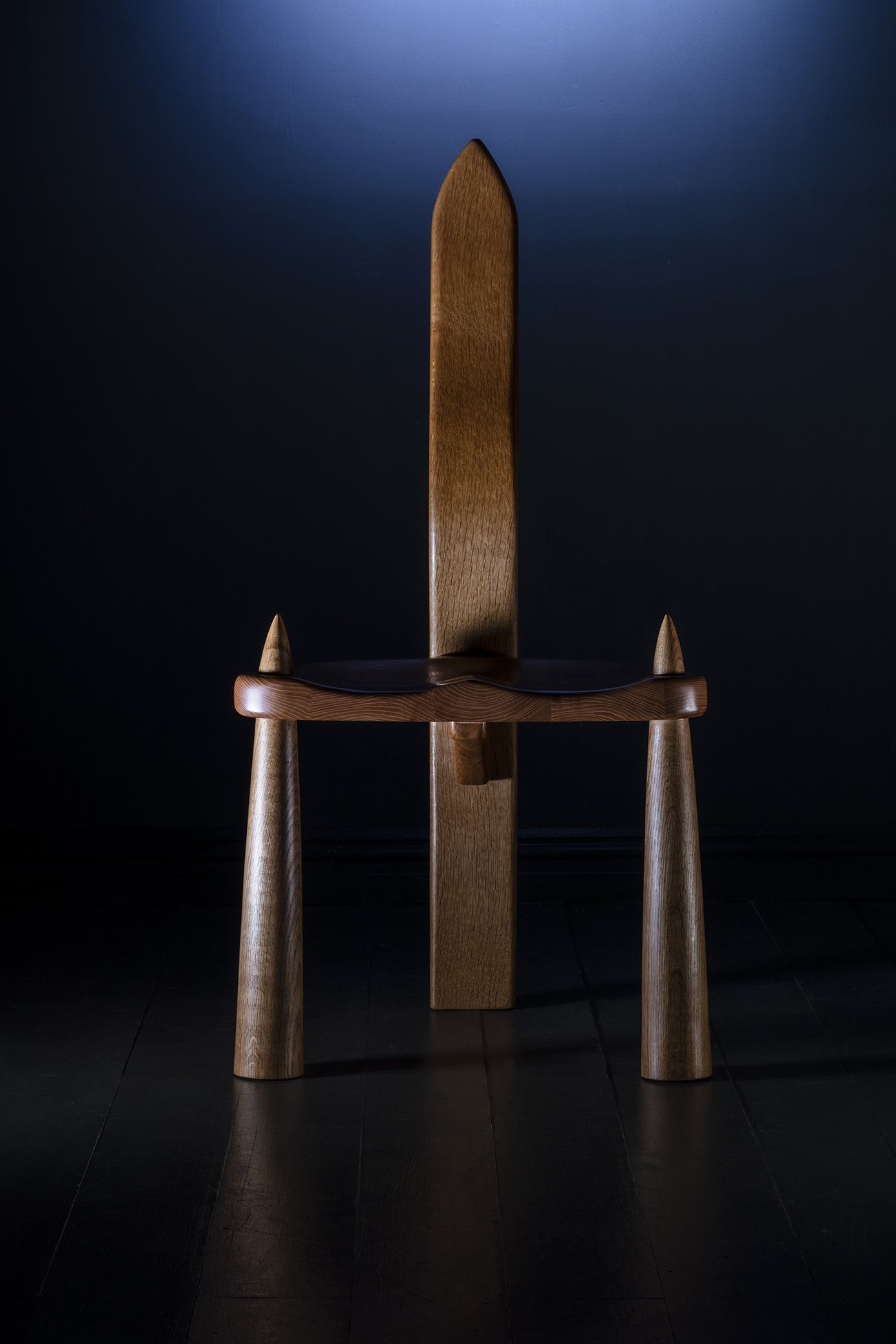 chair made with traditional elm hand carved seat, oak turned legs pretruding through the elm seat and a laminated steam bent ergonomic oak back rest