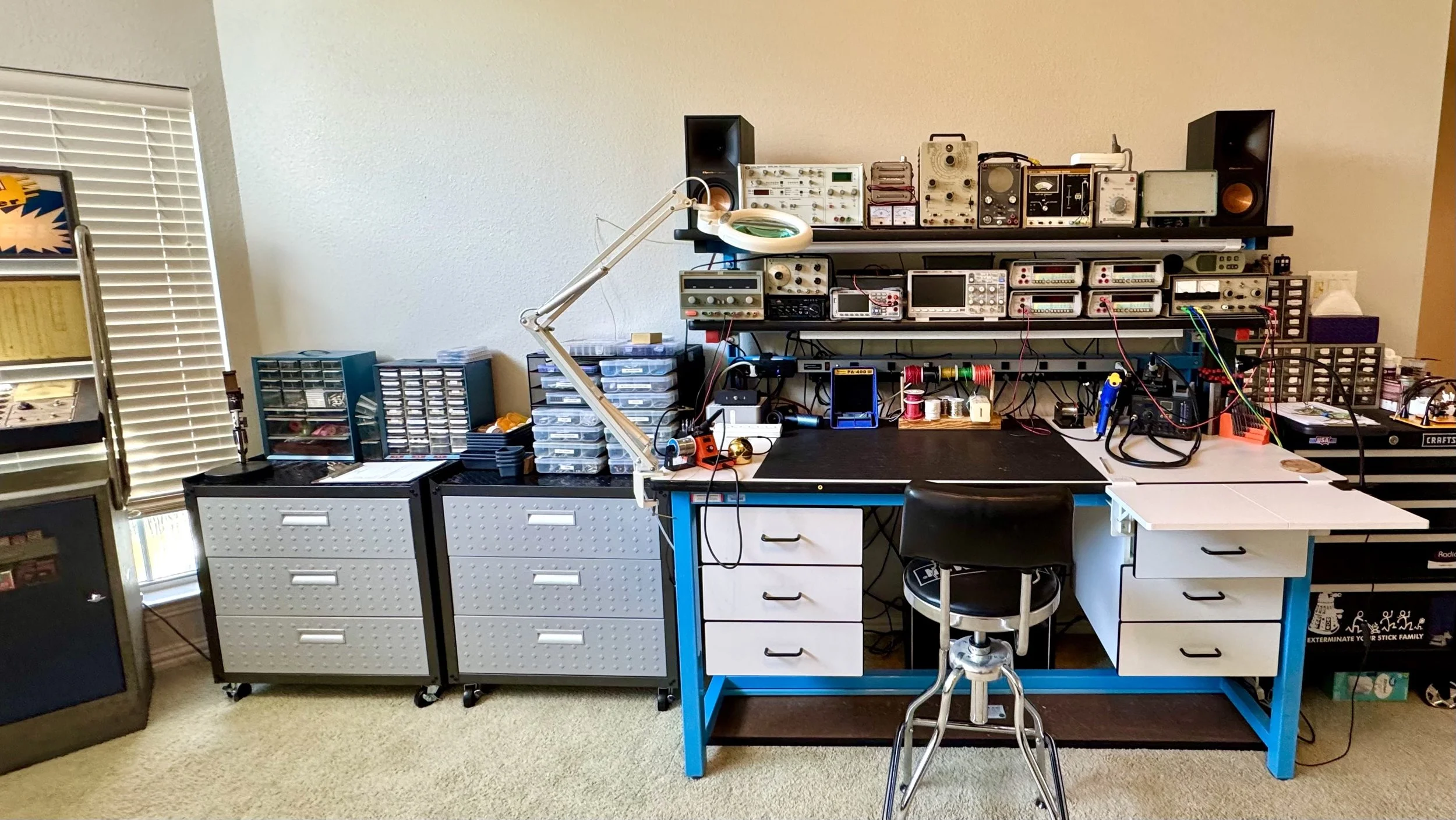 A wide angle photo of the main workbench of Analog Clinic