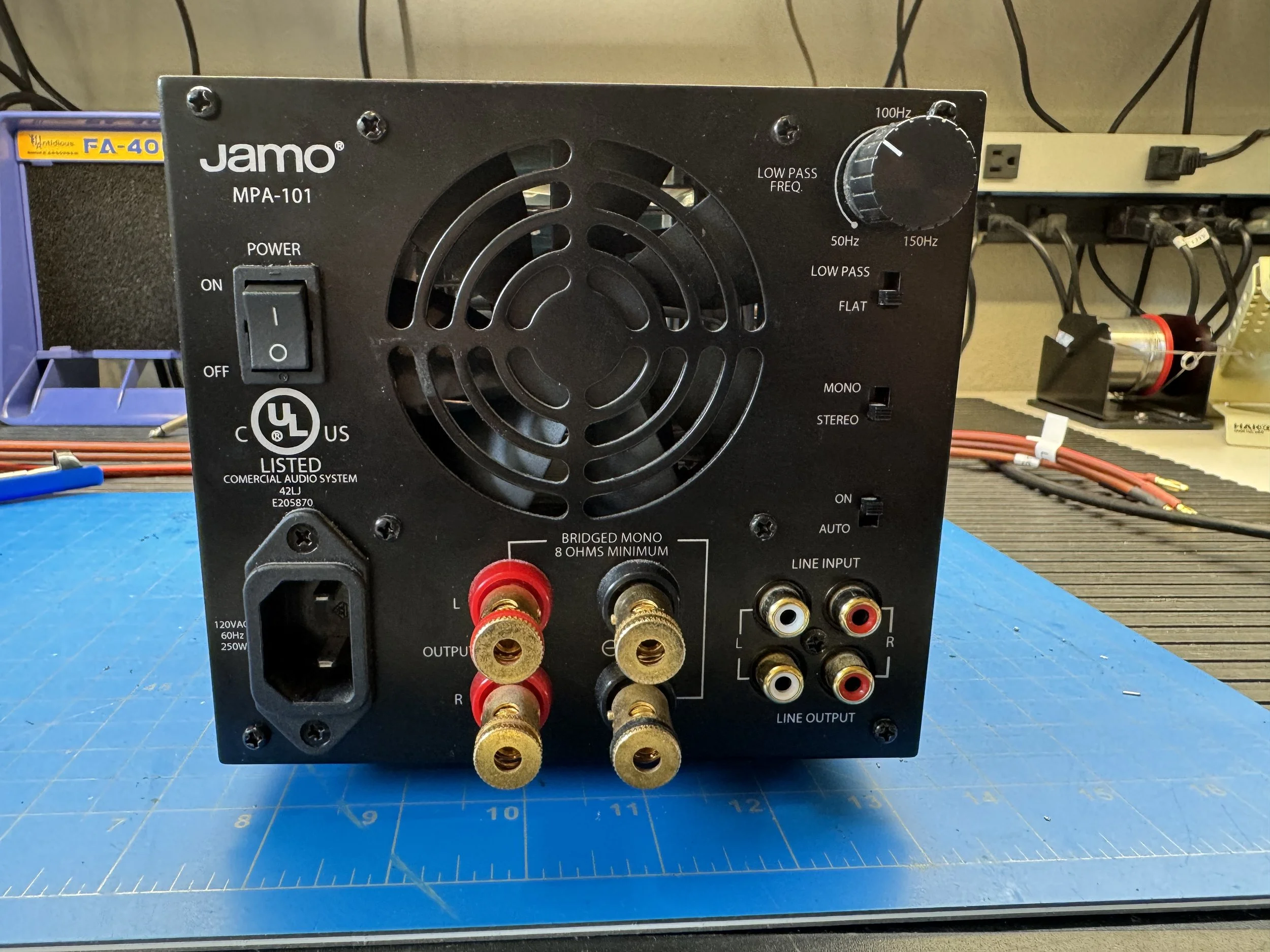 Left-channel power amplifier board in the Jamo MPA-101 showing the rear panel layout.