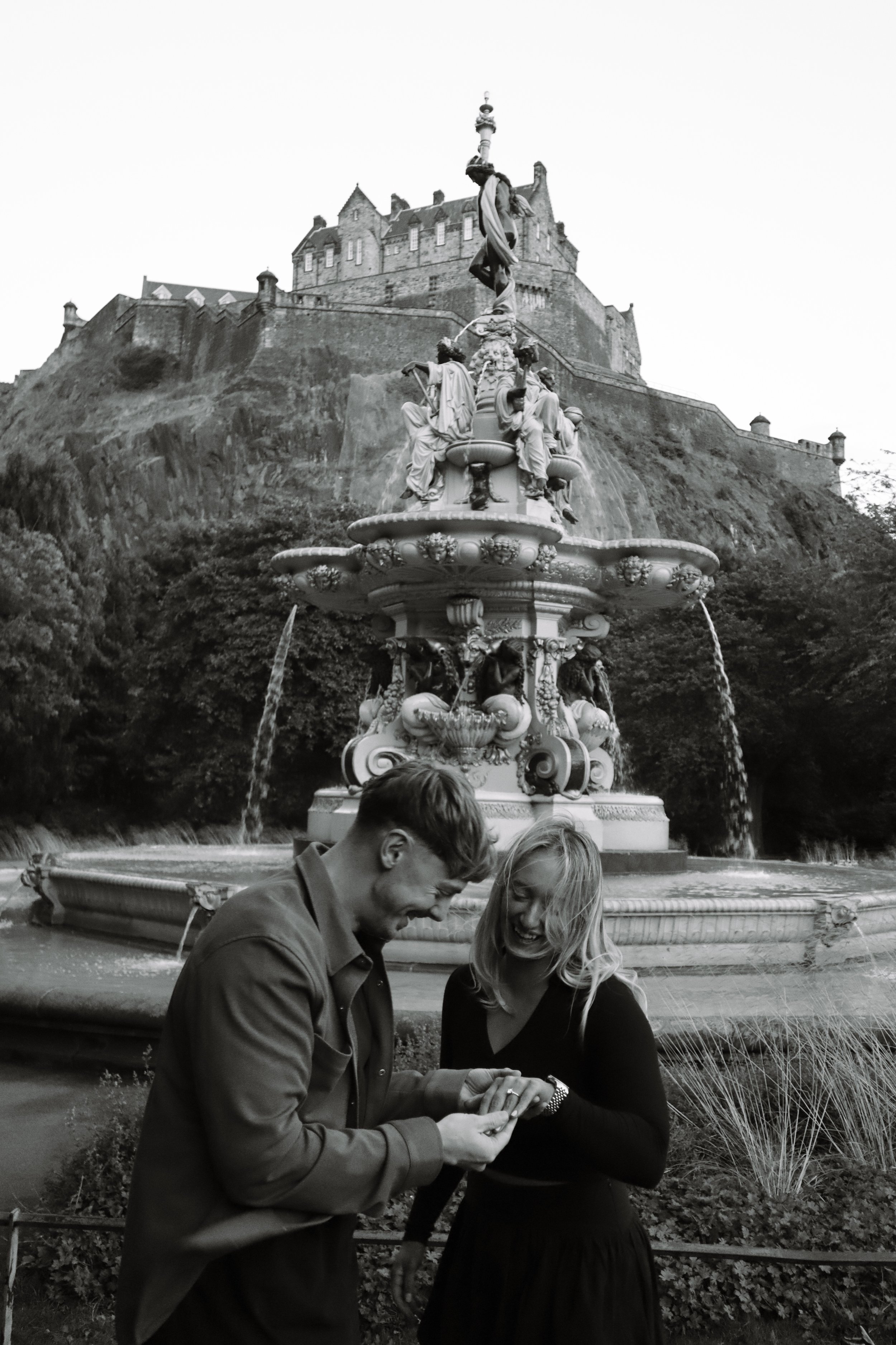 Engagement shoot - Edinburgh castle in the background. Photographed by Emily Gould, Edinburgh based photographer working across film and digital formats.