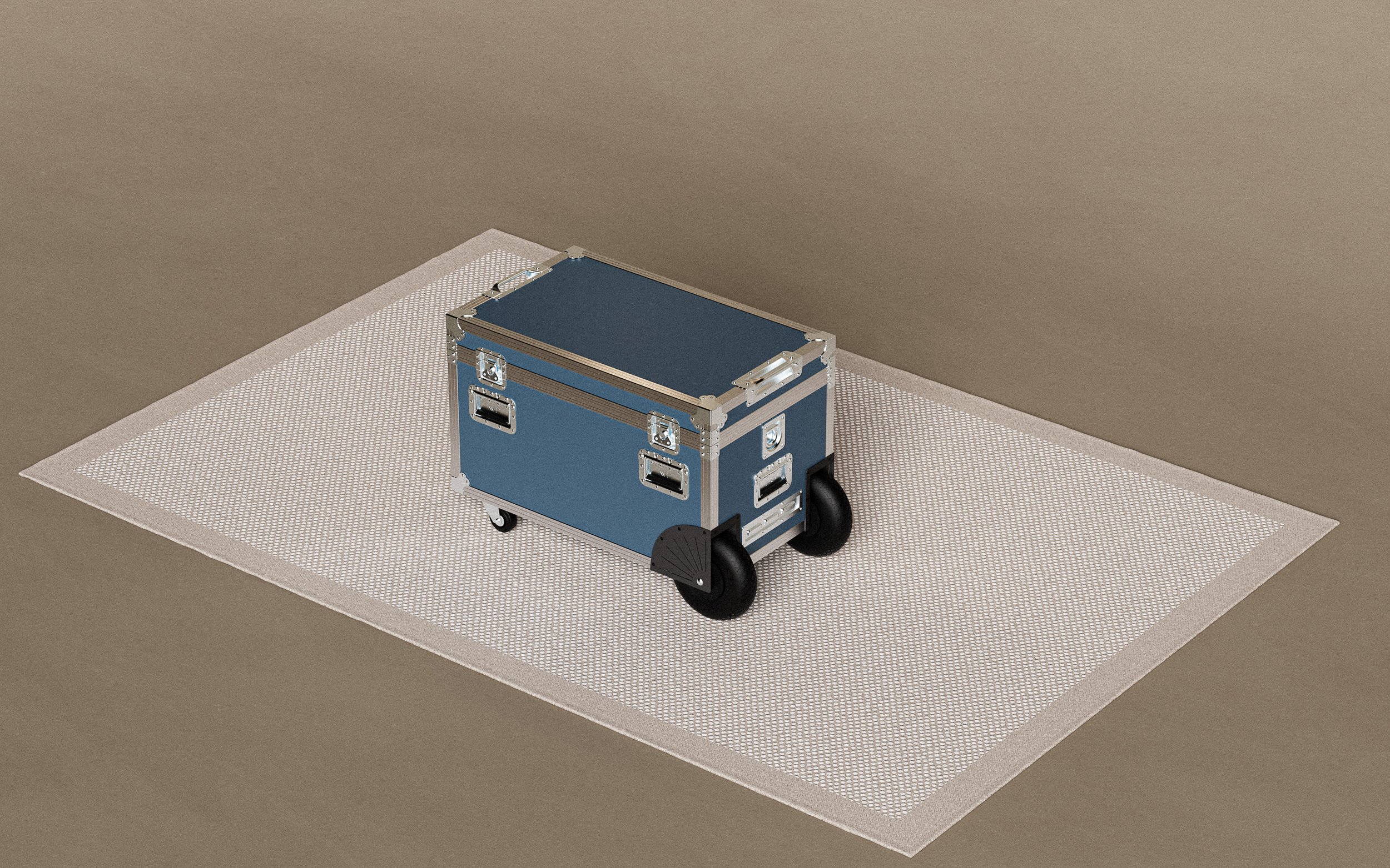 A blue and silver flight case on wheels placed on a white mat on a beige surface.