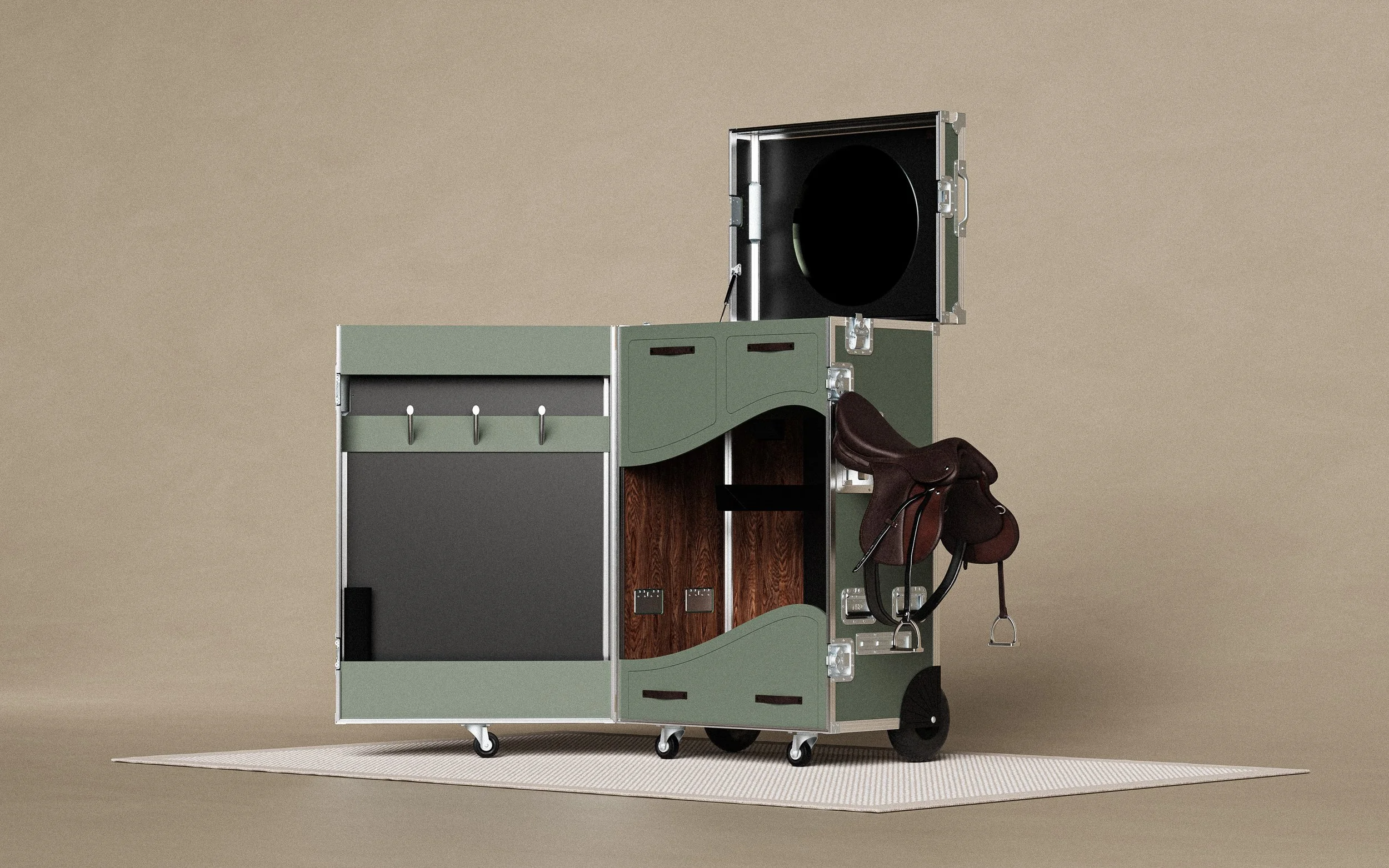 A green equestrian tack trunk with an open lid revealing a black interior, positioned on a beige rug on a plain background.