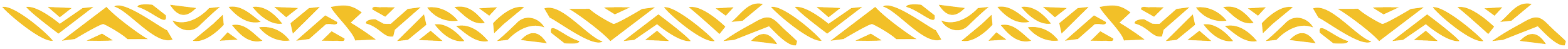 Close-up image of a yellow and black patterned fabric or surface with zigzag and geometric shapes.