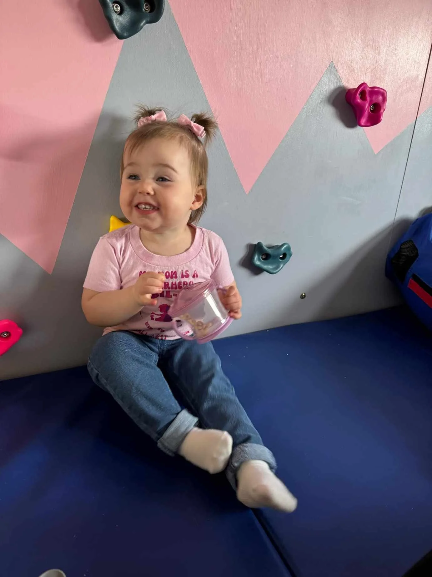 addie and climbing wall