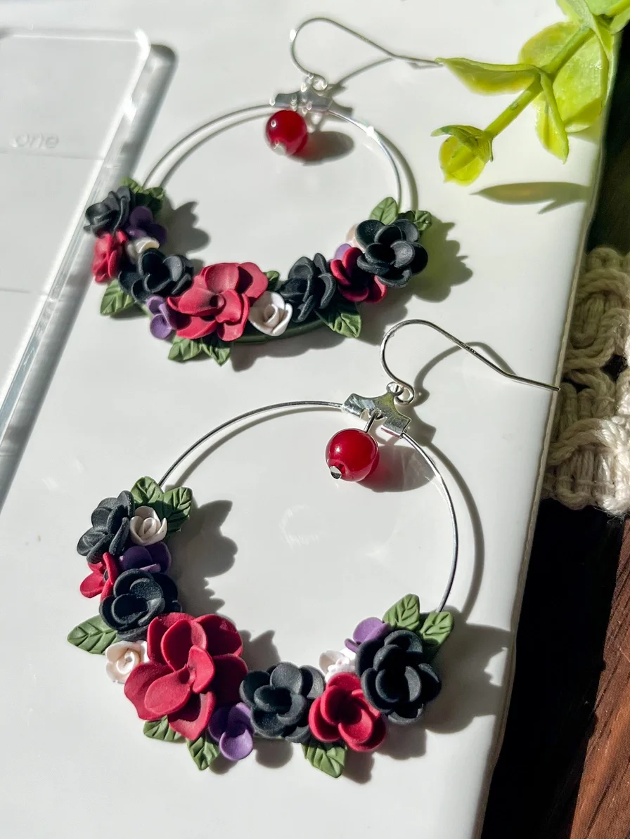 Dark floral sculpted hoop-- sterling silver