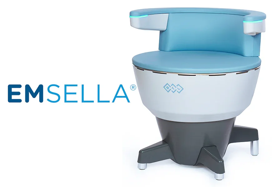 A futuristic medical or laboratory chair with a blue cushioned seat and backrest, microphones or sensors attached, and the brand name 'EMSELLA' next to it.