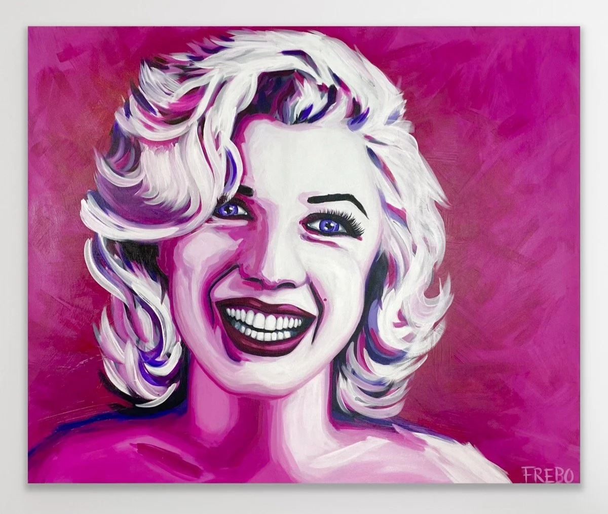 Colorful portrait of a woman with platinum blonde hair, bright blue eyes, and a big smile against a pink background.