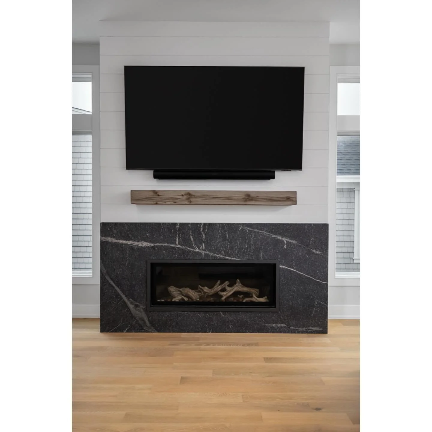 It&rsquo;s still fireplace season so keep staying warm and cozy 🔥 

This beach house fireplace featured a beautiful drift wood interior, marbled stone exterior, and wood accent below the tv.

Photos shot and copyrighted by @willventuresphoto please 