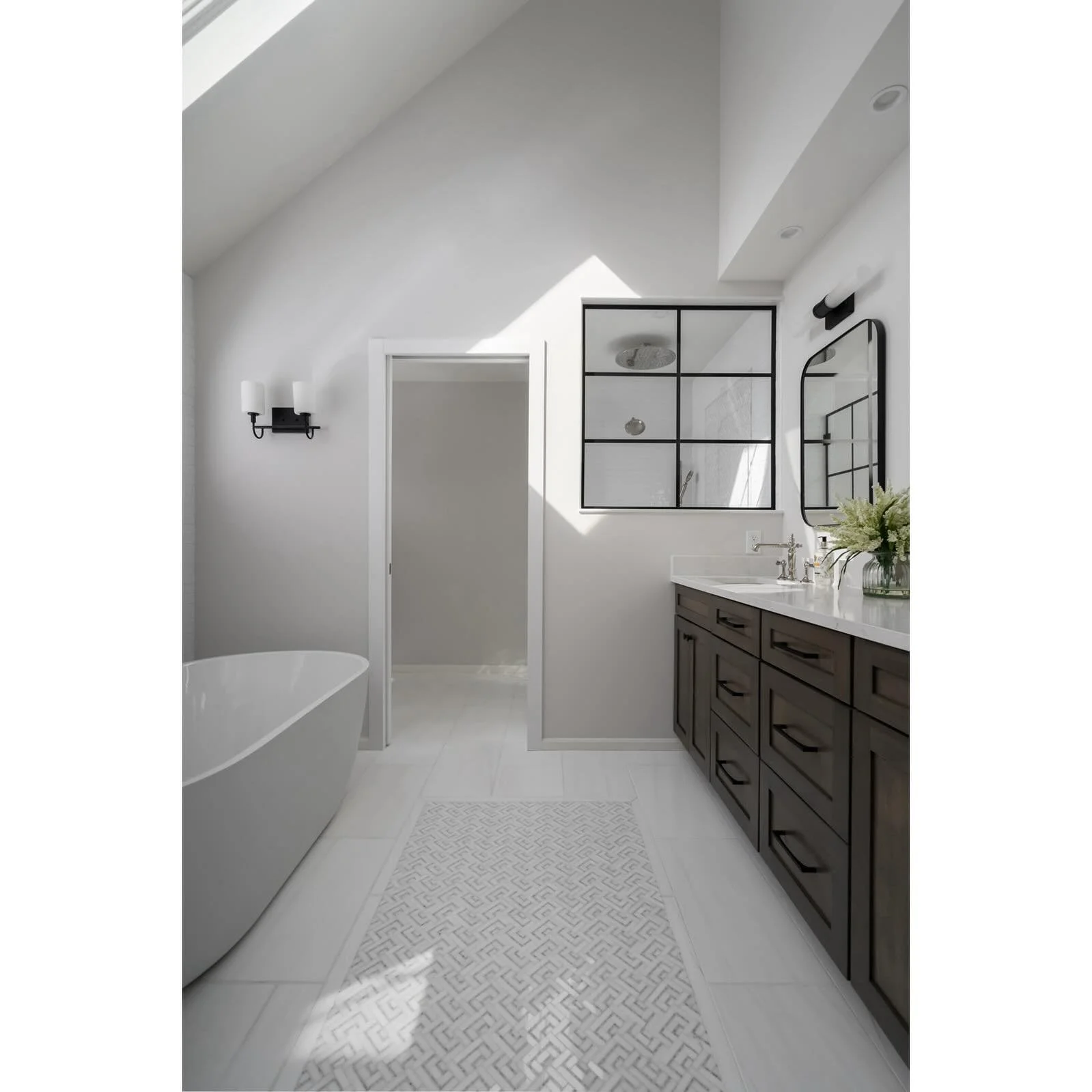 I thoroughly enjoyed the warm bright sunlight illuminating this brand new designed bathroom.

From the tile details, shower peak through window, and large soaking tub, this bathroom was stunning.

When the natural light helps illuminate amazing work 