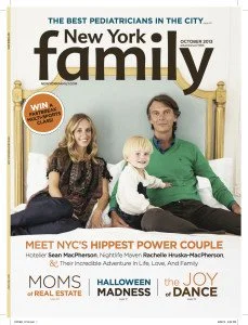 Photo of a family sitting on a bed with a woman, a man, and a baby, on the cover of New York Family magazine, October 2020.