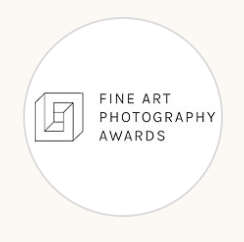 Logo for Fine Art Photography Awards with a geometric design on the left.