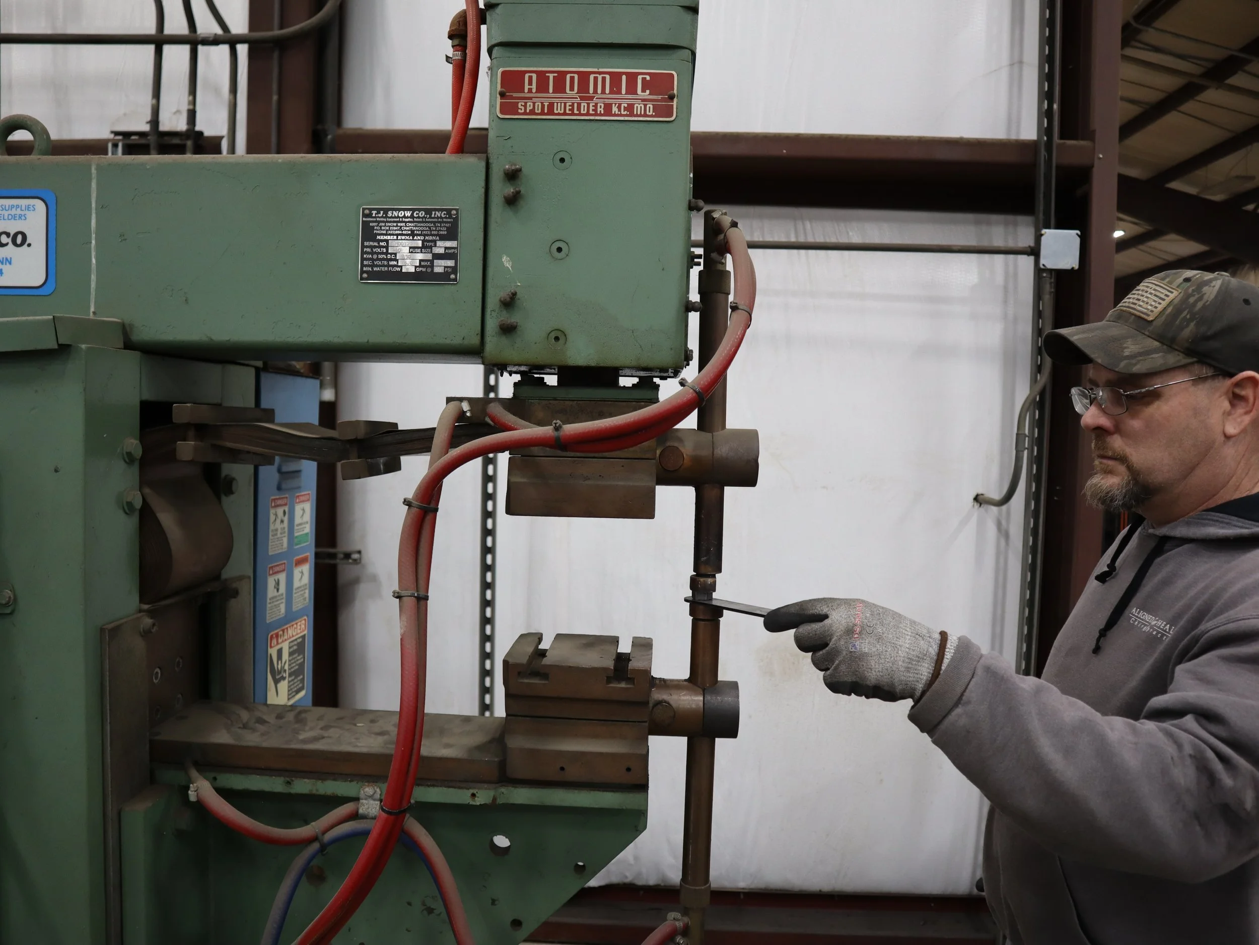 a person working at a metal fabrication facility