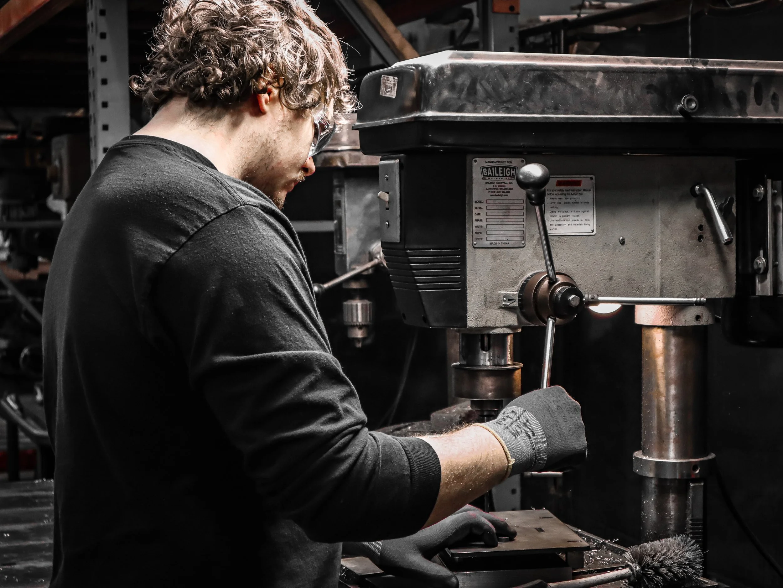 A man working in a metal fabrication facility