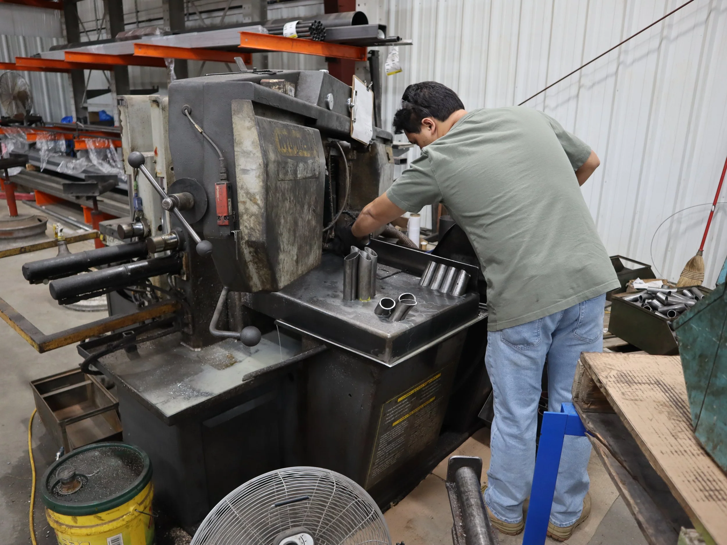 A man working at a metal fabrication facility