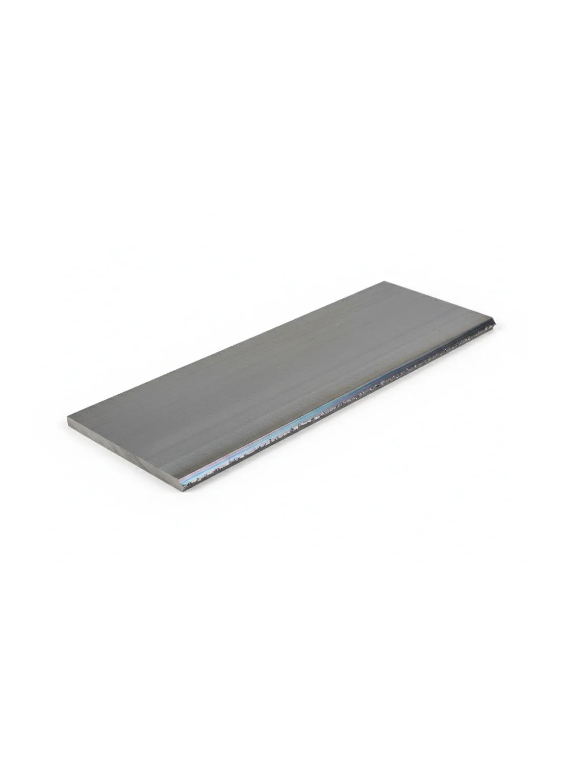 A flat, rectangular piece of metal, likely stainless steel, with a smooth surface, placed on a white background.