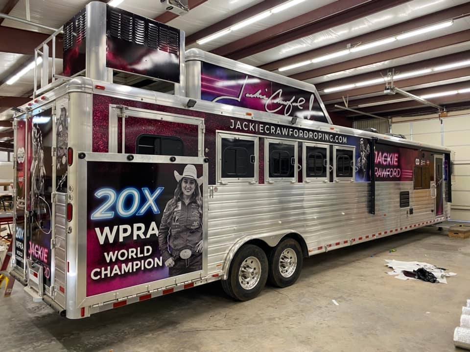 Pink and black vehicle wrap for jackie crawford world champion