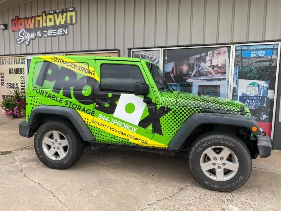 Black and green Probox portable storage Vehicle Wrap on a Jeep 