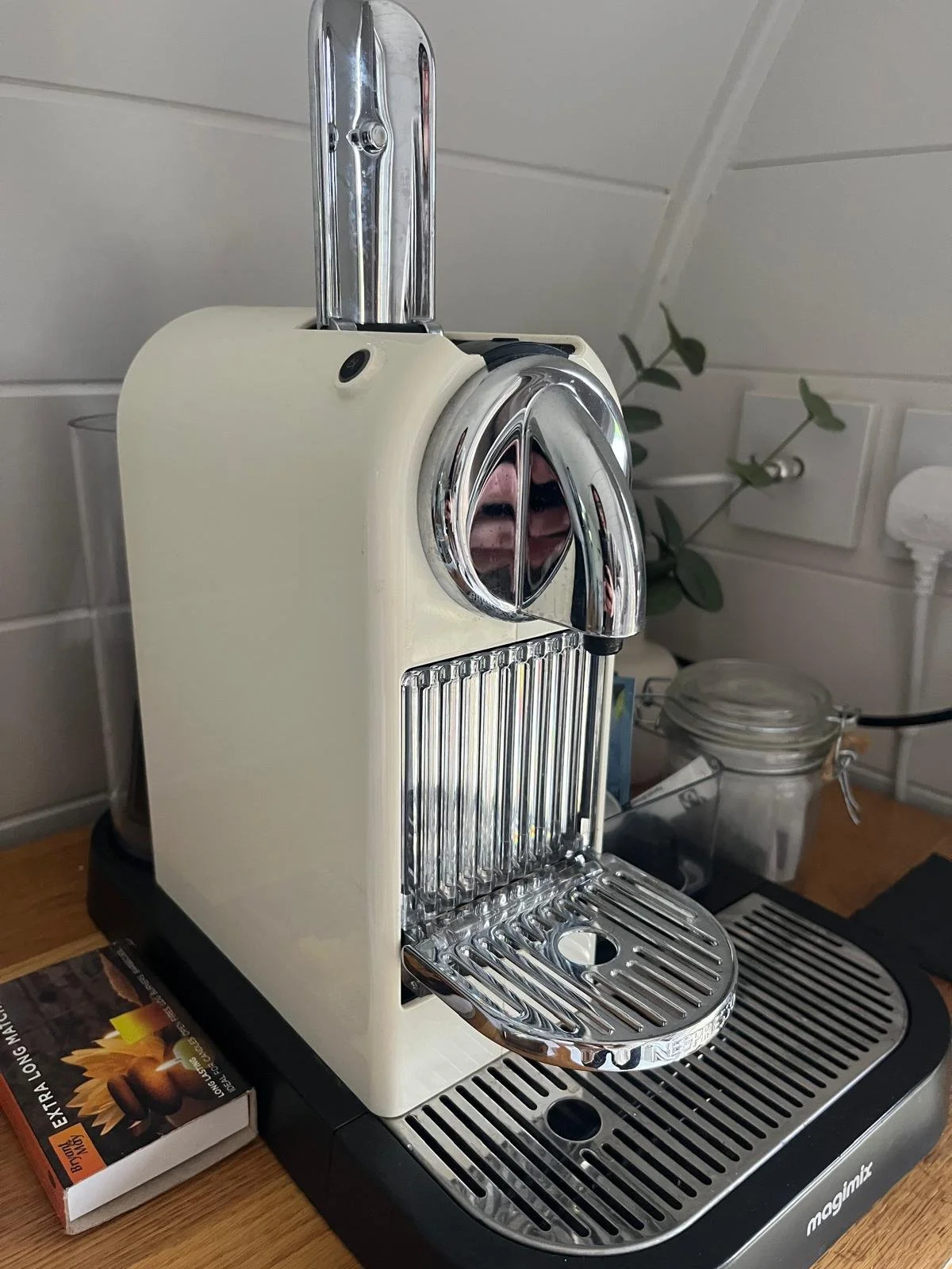 Nespresso machine, pods and milk frother included in the pod