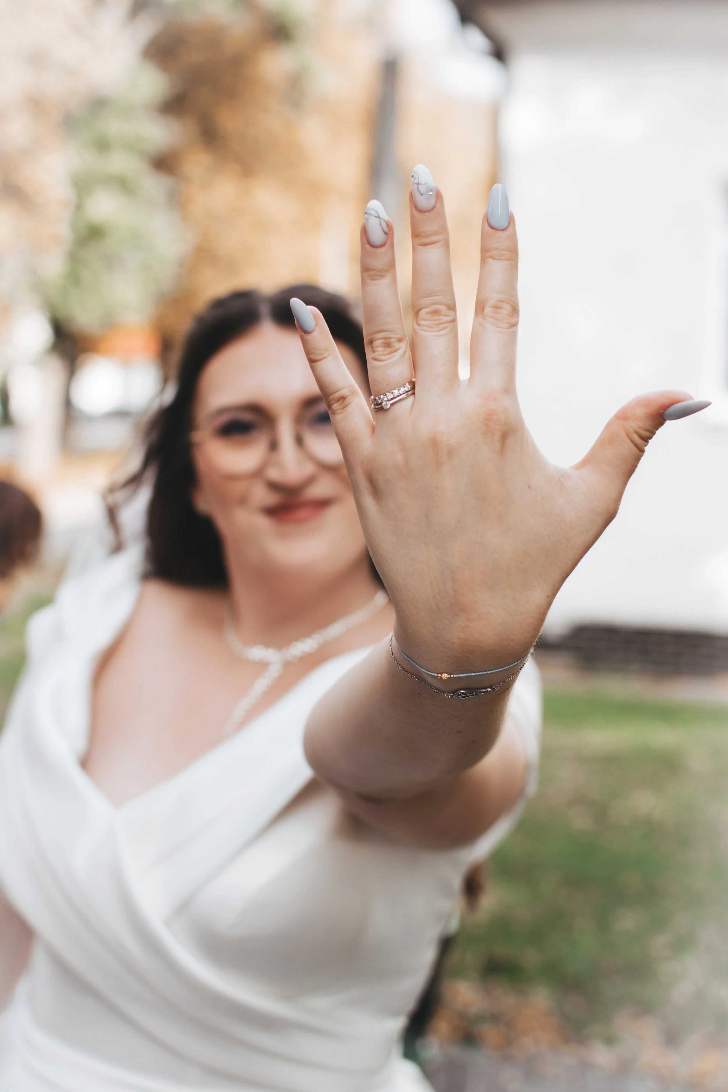 bride-proudly-showing-her-ring.jpg