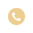 Gold phone icon with a telephone handset inside a speech bubble.