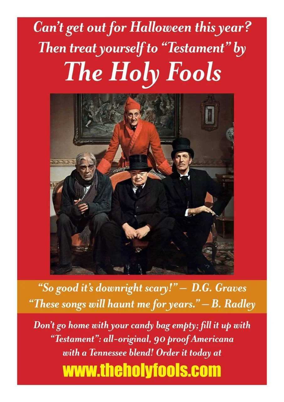 Group of four men dressed in old-fashioned attire, sitting and standing in a vintage room with a painting and framed picture on the wall. The poster promotes a product called 'Testament' by The Holy Fools, with humorous quotes and a website address.