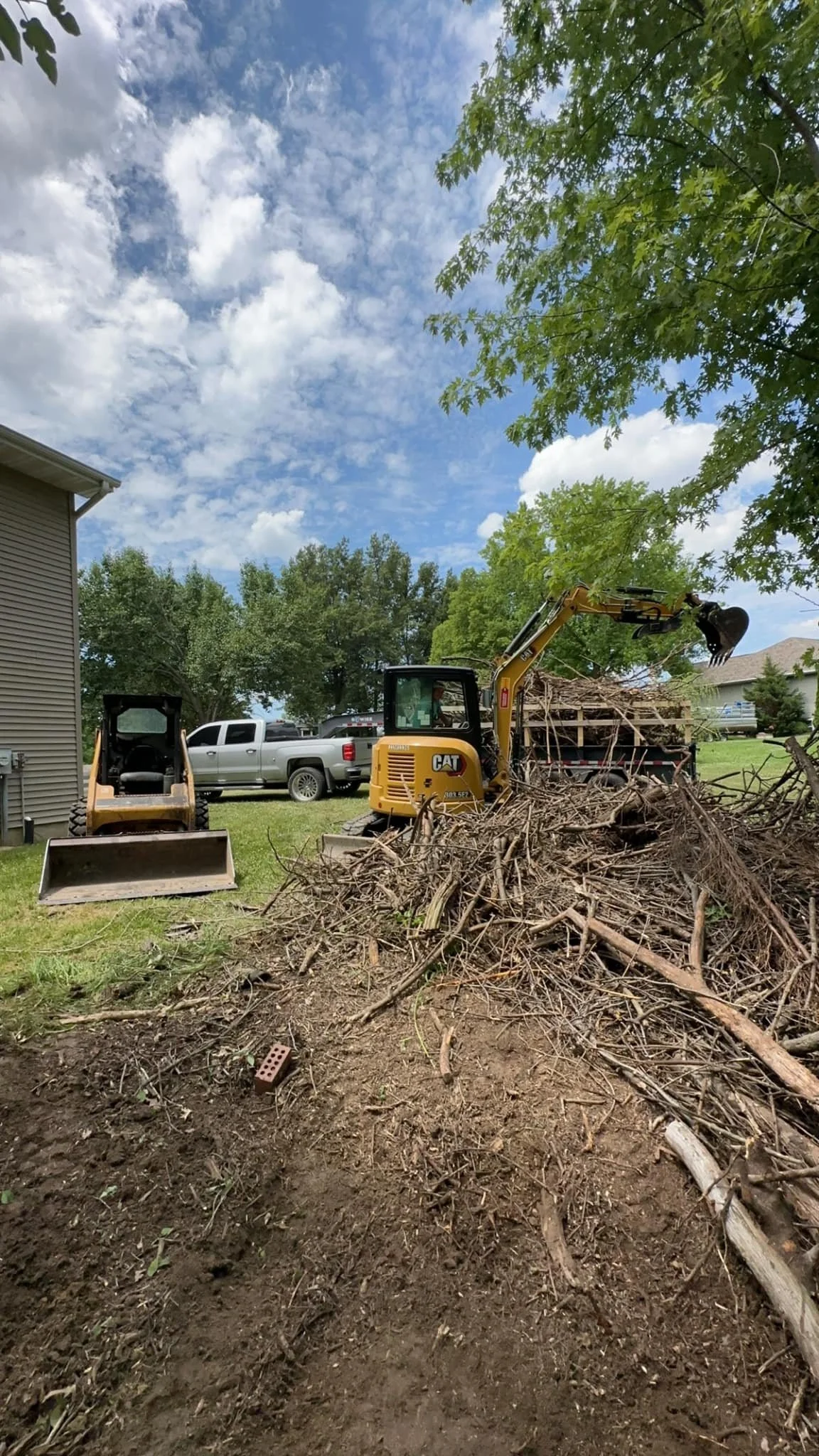 Hauling Out Massive Brush Pile