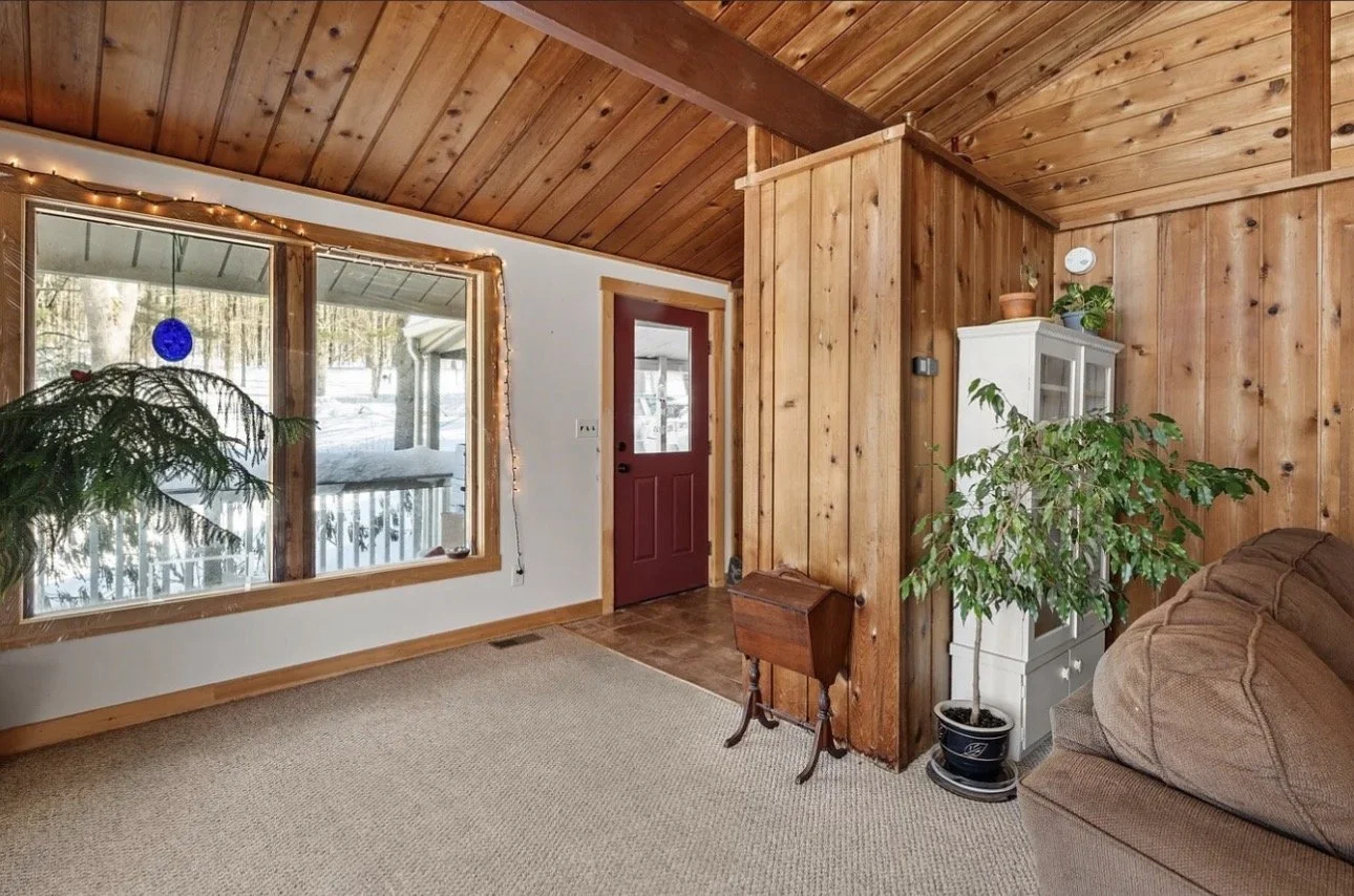 living room before ski chalet mcm stowe vermont