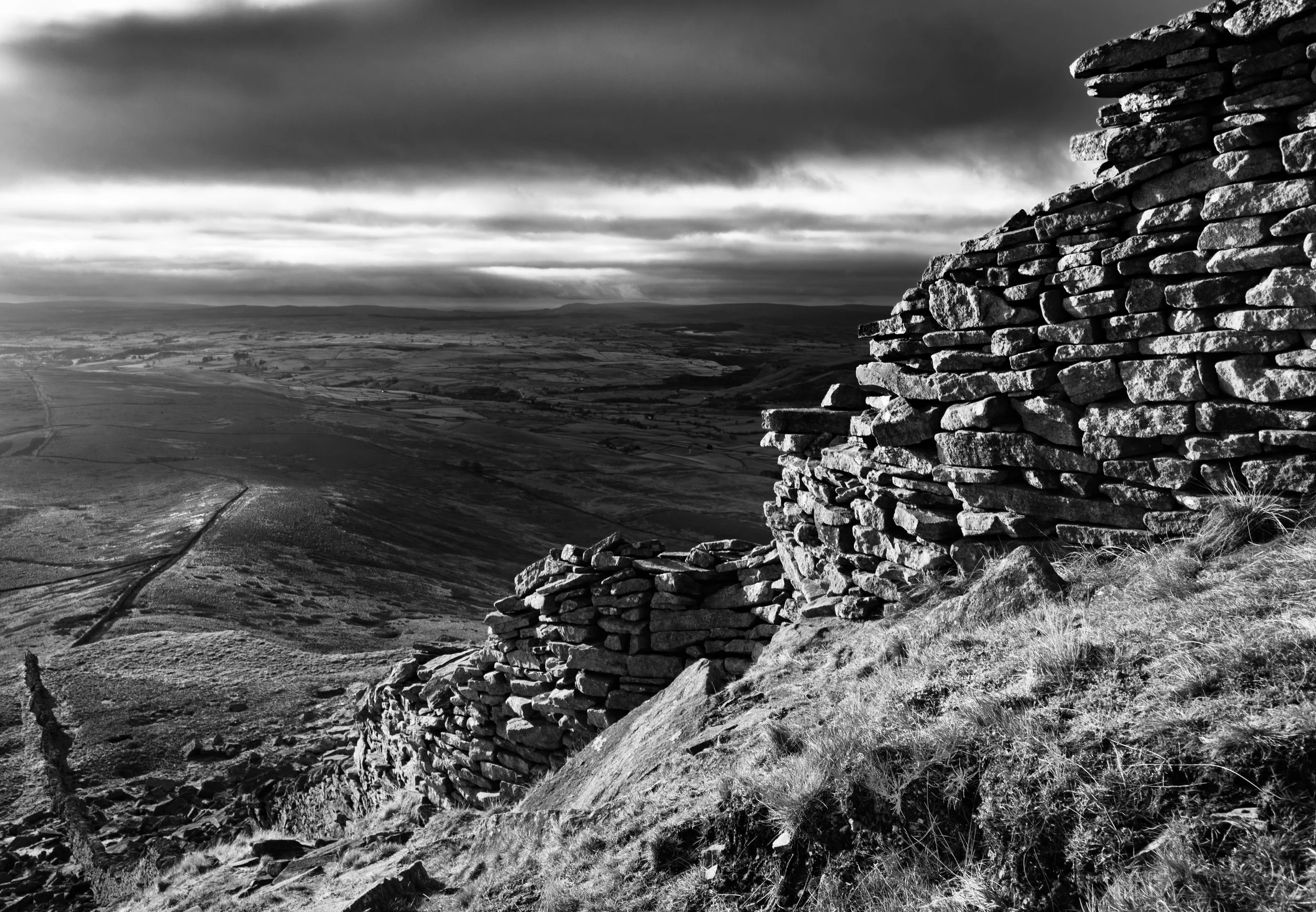 Limestone wall clings to the side on Pen-y-Ghent, Yorkshire Dales National Park. January 2026