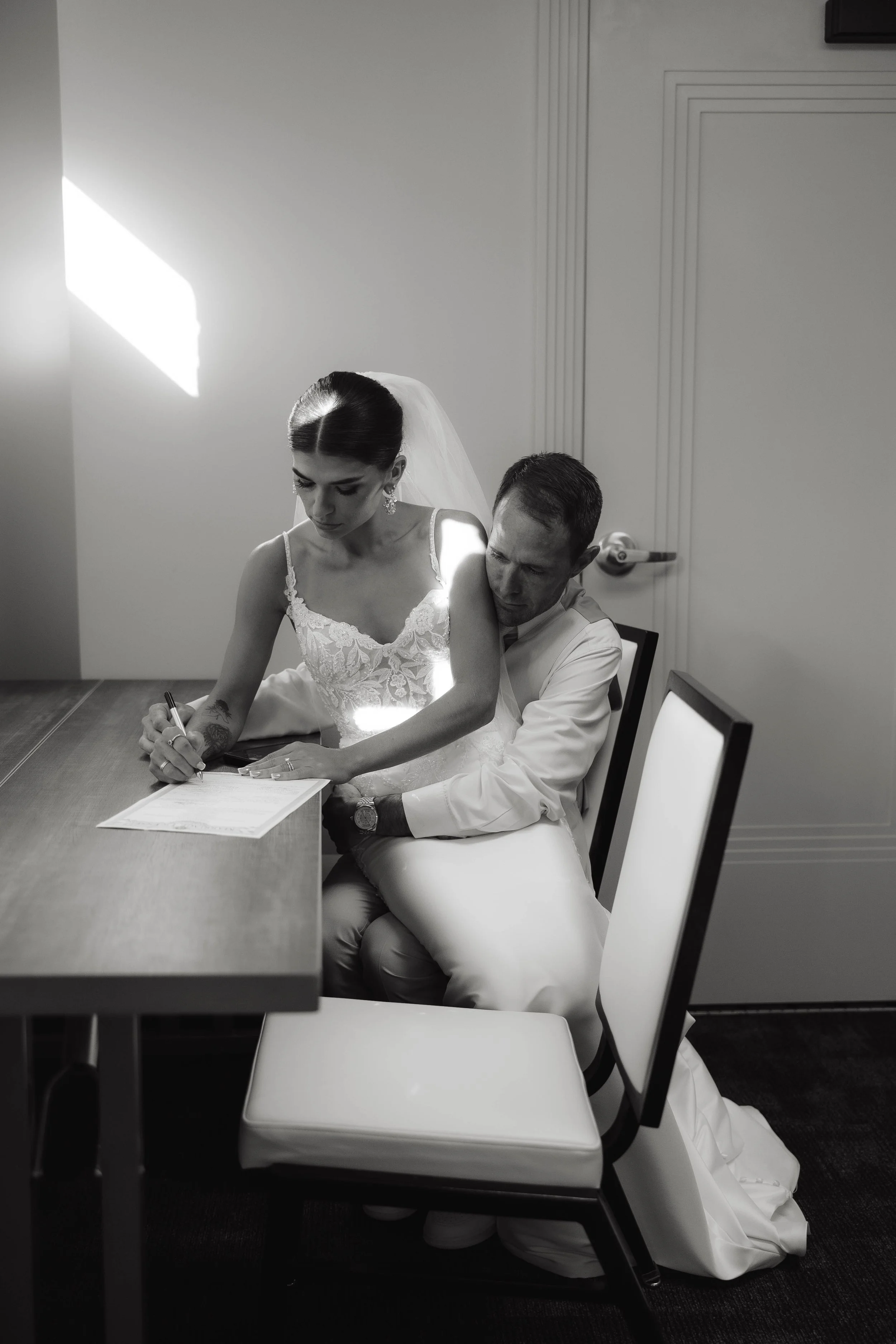 couple-signing-marriage licence-wedding-photography.jpg