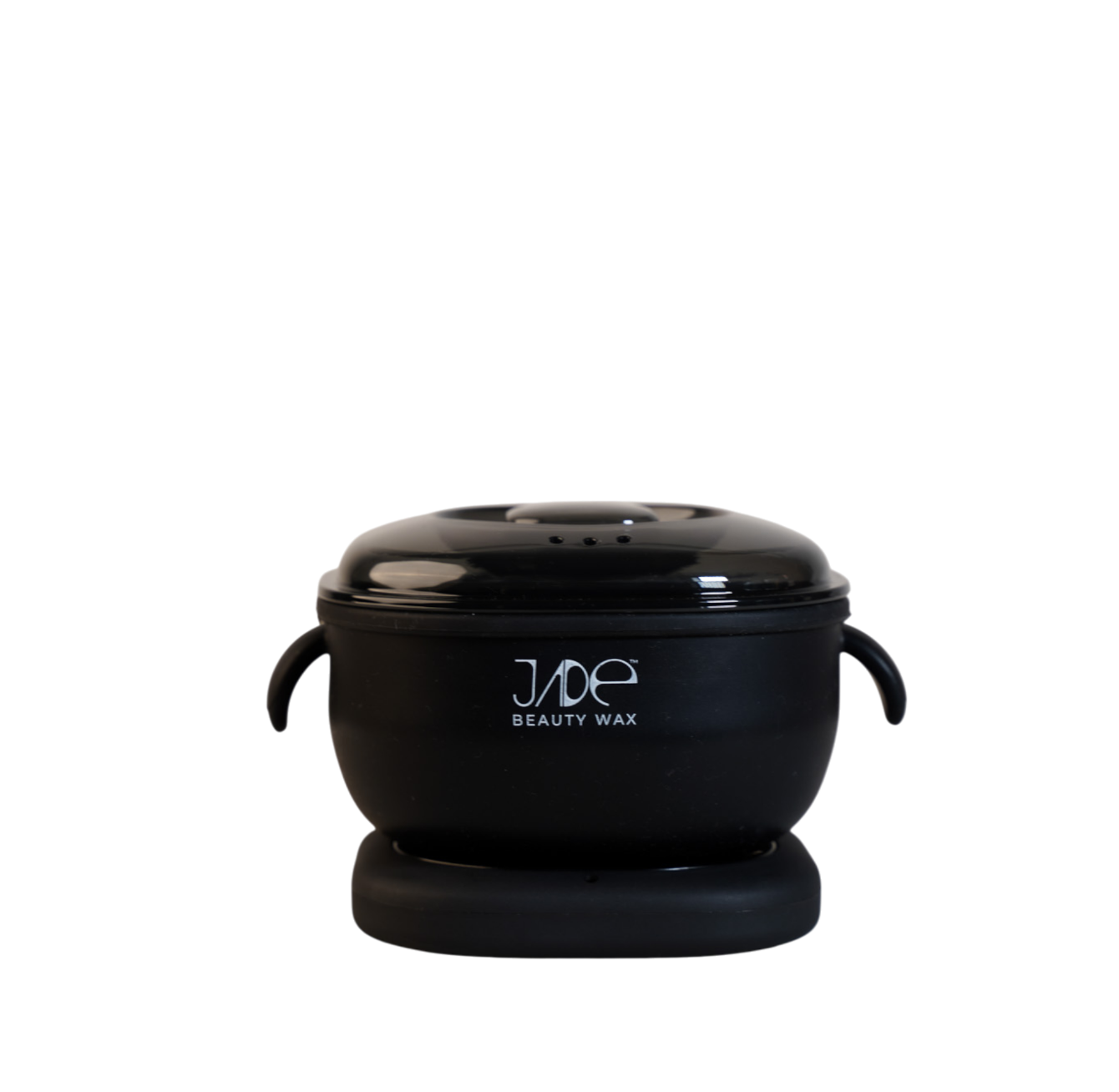 Black jar labeled 'Jade Beauty Wax' with a lid, placed on a black base, isolated on black background.