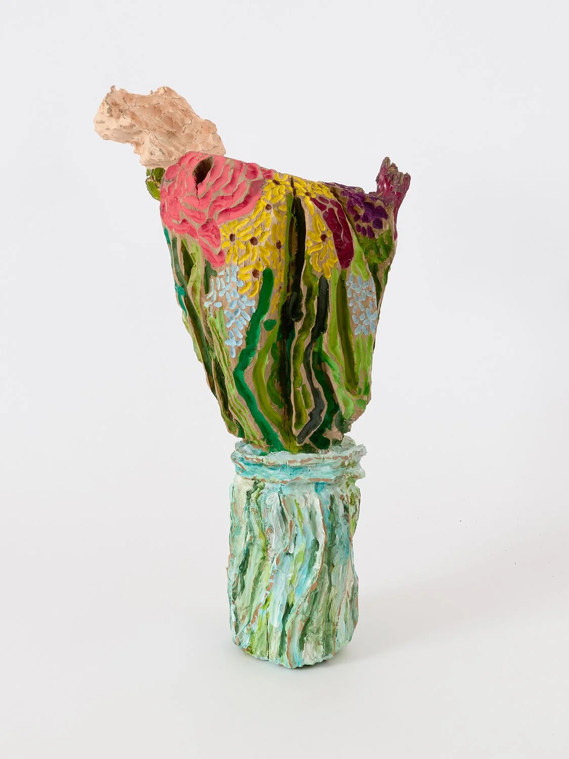 Colorful semi-abstract sculpture of a bouquet of flowers, carved in wood and painted by artist Brent Owens.
