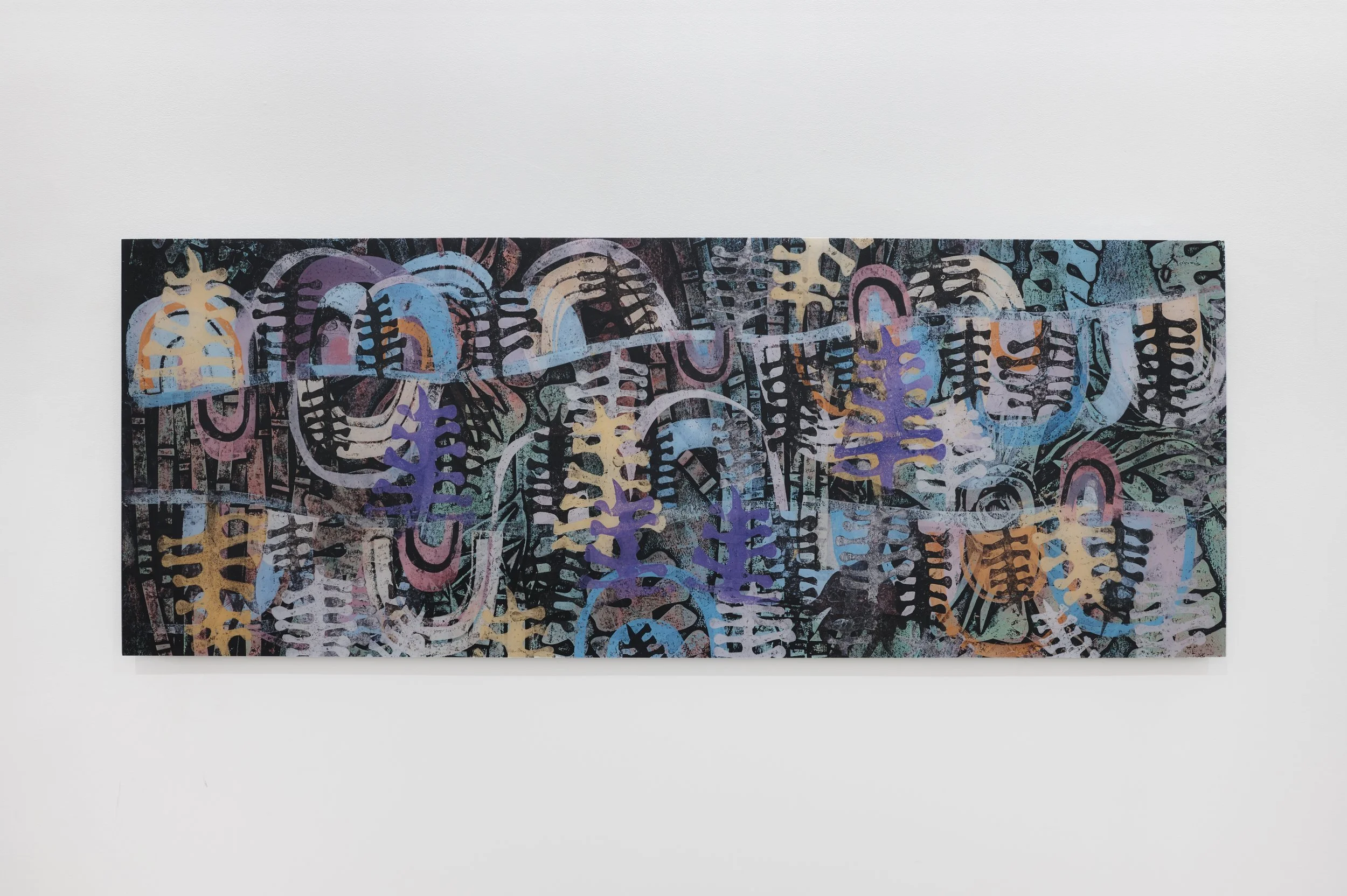 Colorful abstract print with layered patterns and shapes on a black background, mounted on a white wall by artist Lisa Prives.