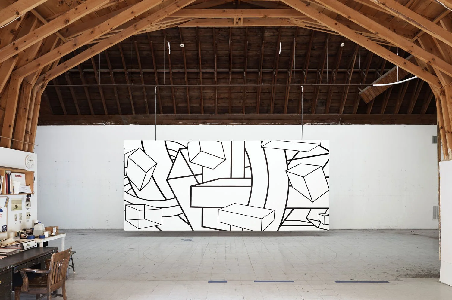 A view of artist, Al Held's studio with painting titled: Noah's Focus I.