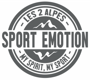 Logo circulaire avec montagnes, texte "Les 2 Alpes", "Sport Emotion" au centre, et la phrase "My Spirit, My Sport" en bas.
