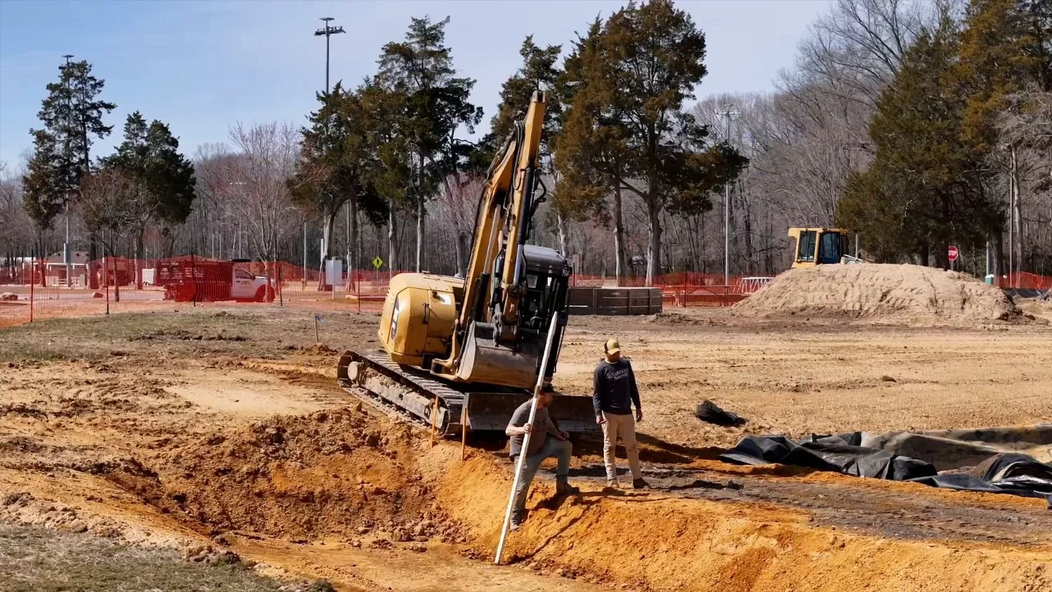 Demolition and site work team operating heavy equipment in Laurel, MD